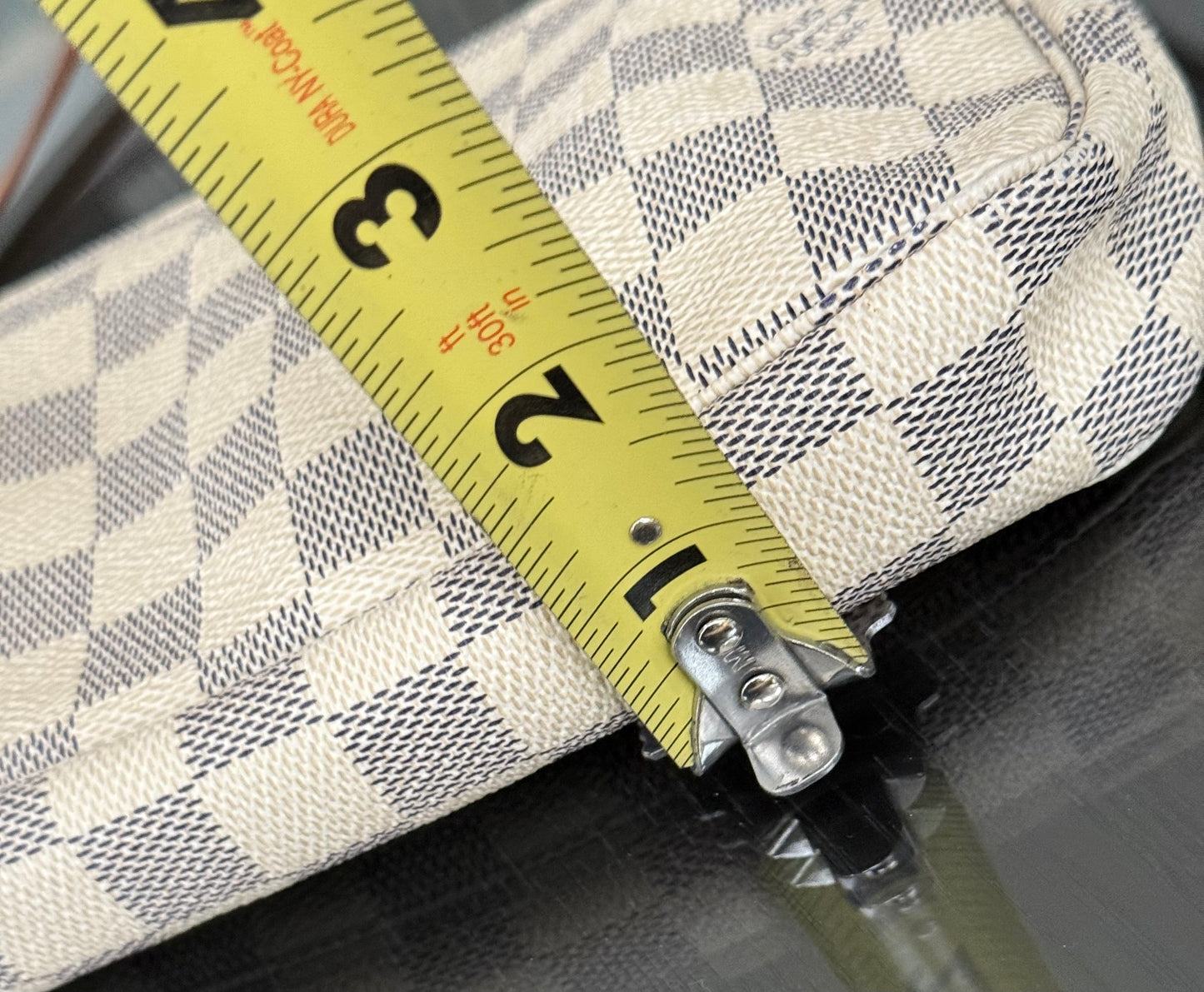 Pochette Accessories in Azur - π
Year: 2007