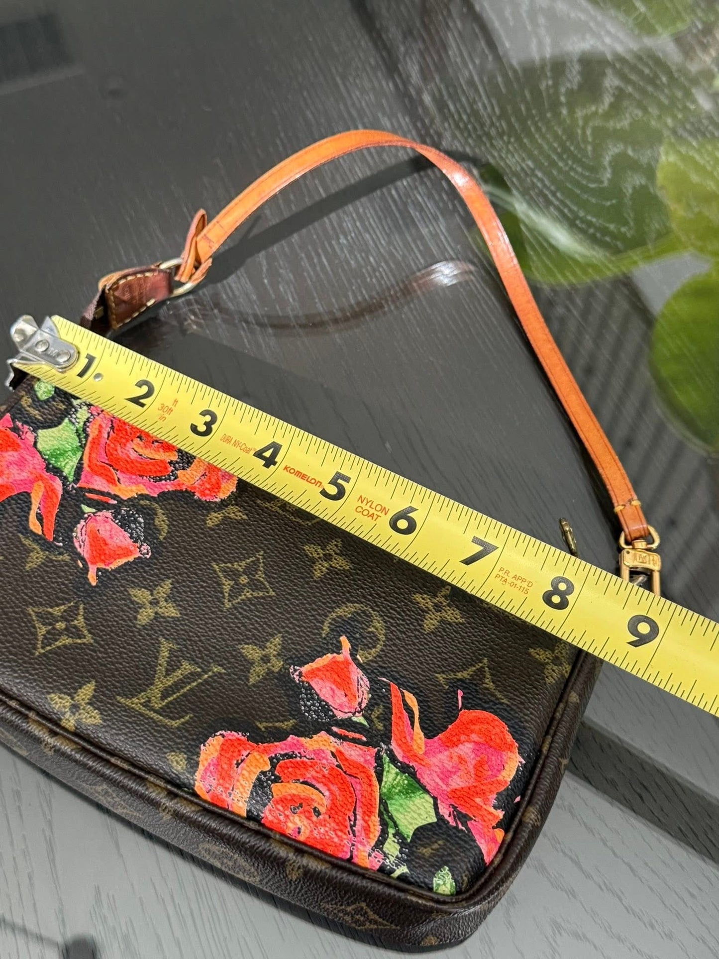 Monogram Roses Pochette Accessories with Dustbag and Paper bag ๐
Year: 2008