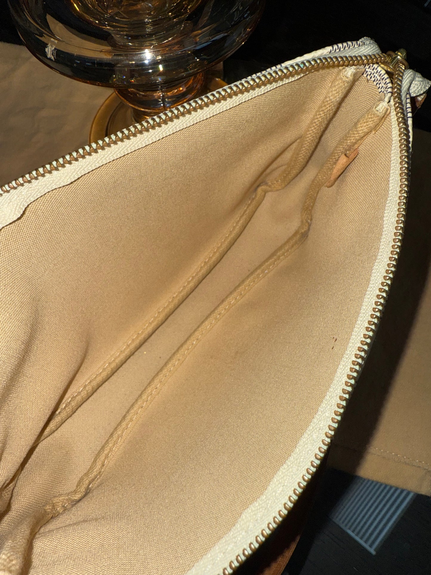 Pochette Accessories in Azur - π
Year: 2007