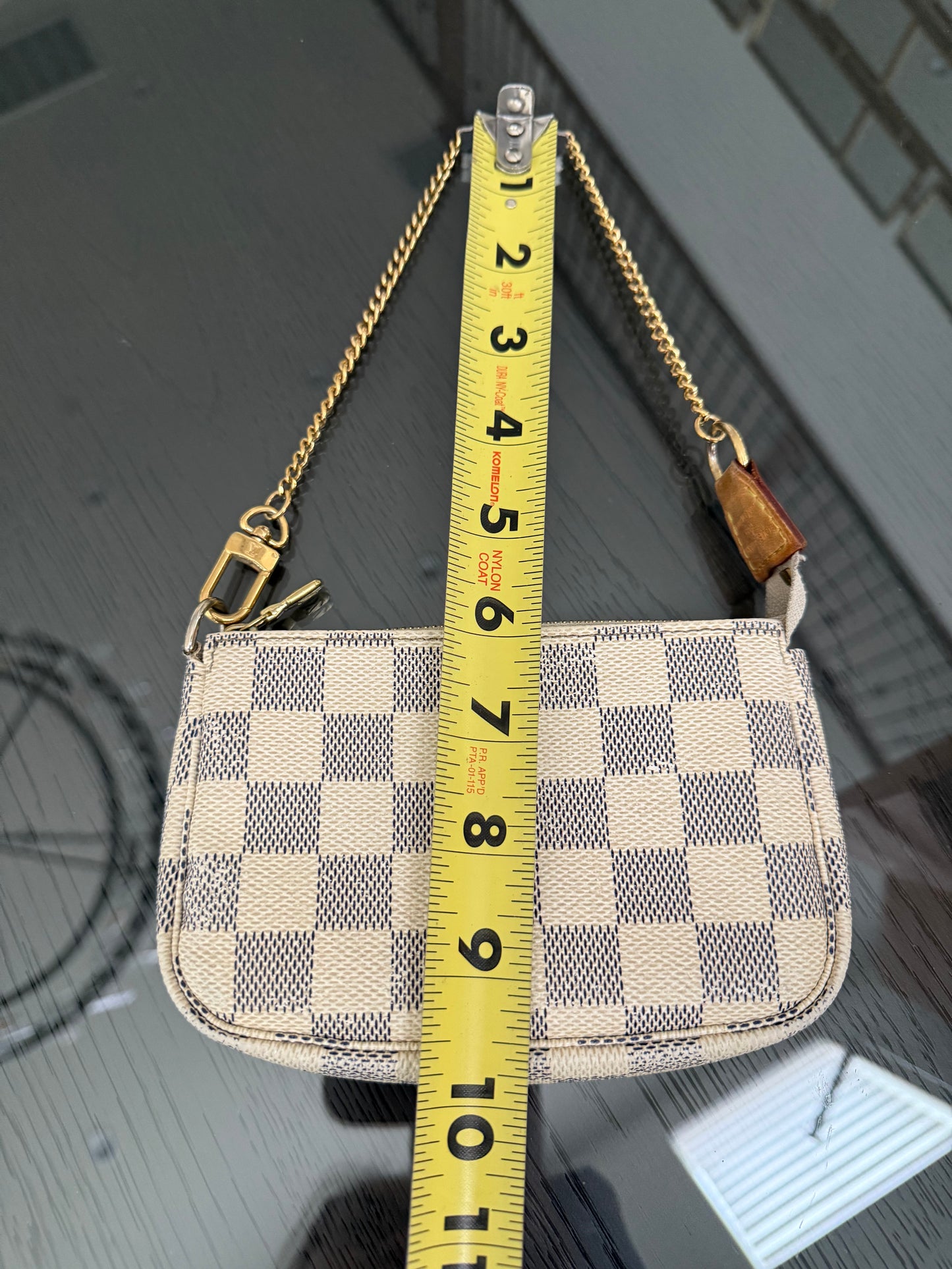 Mini Pochette Accessories in Azur - π
Year: 2010