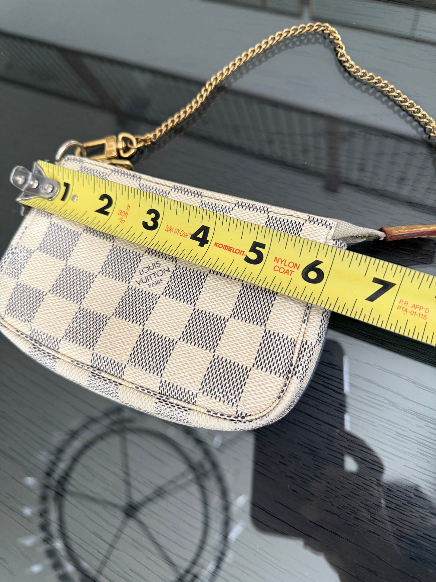 Mini Pochette Accessories in Azur - π
Year: 2010
