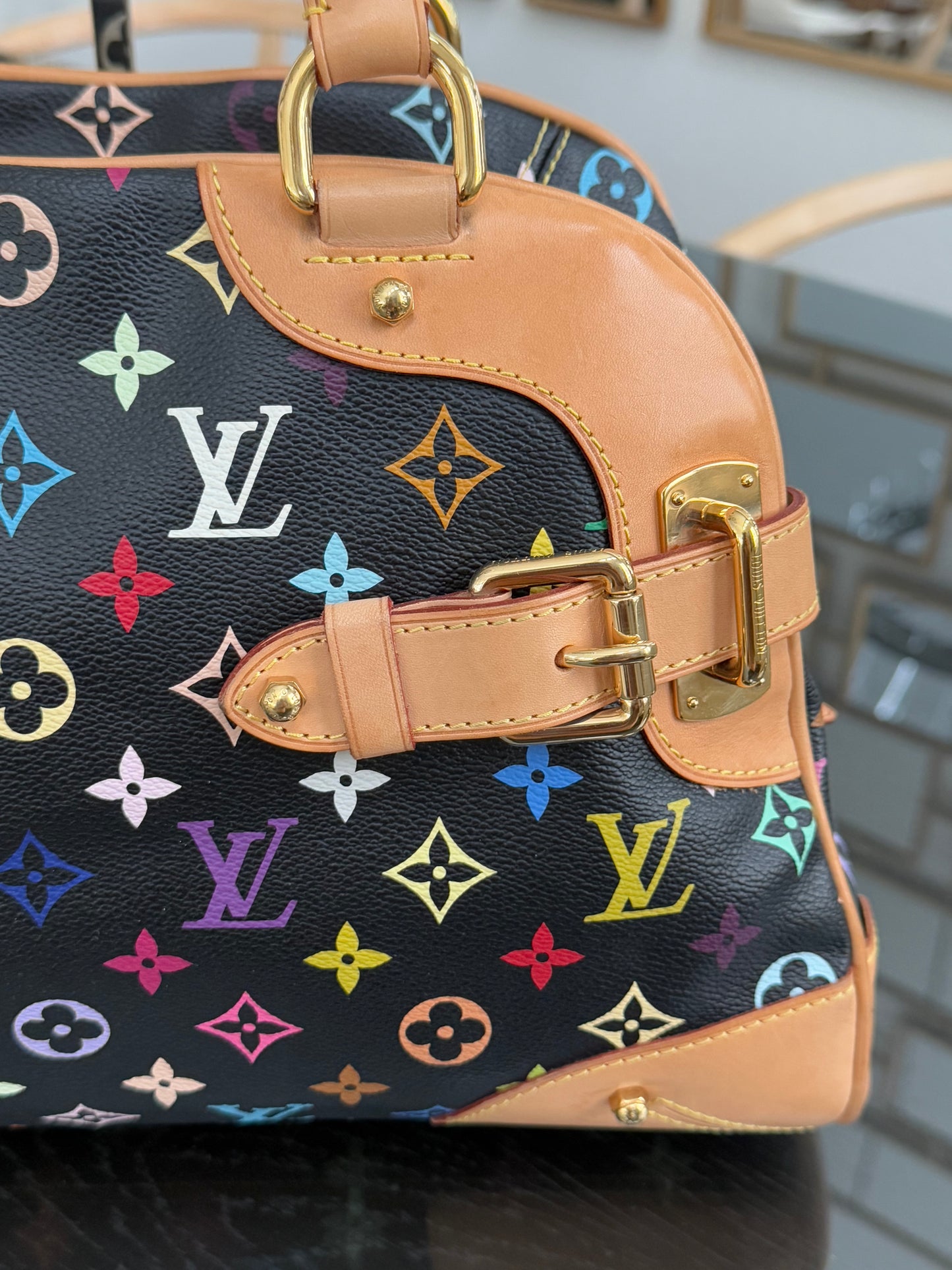 Murakami / Multicolor Claudia with Dustbag π
Year: 2009