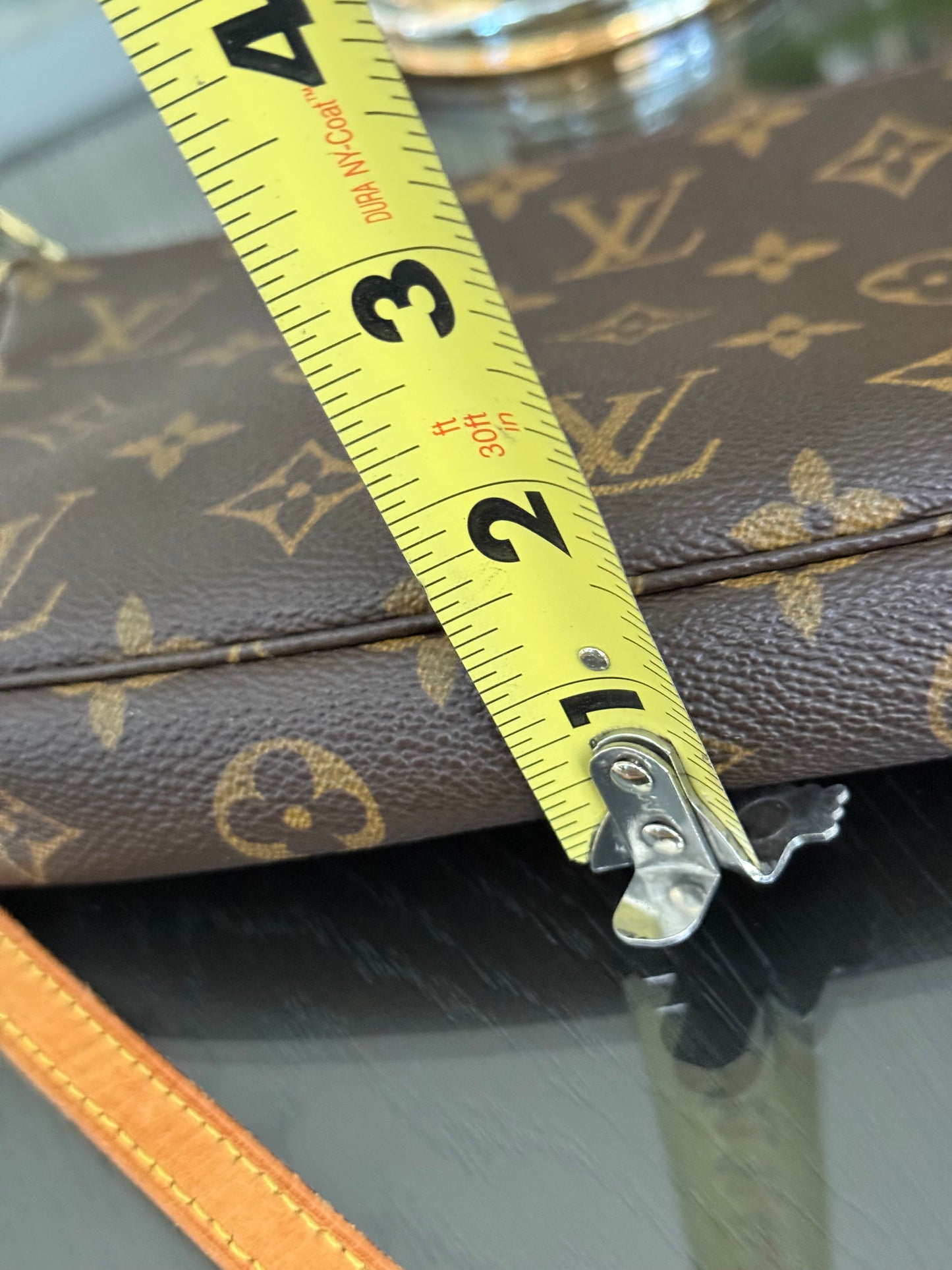 Pochette Accessories with Crossbody Strap - π
Year: 1999