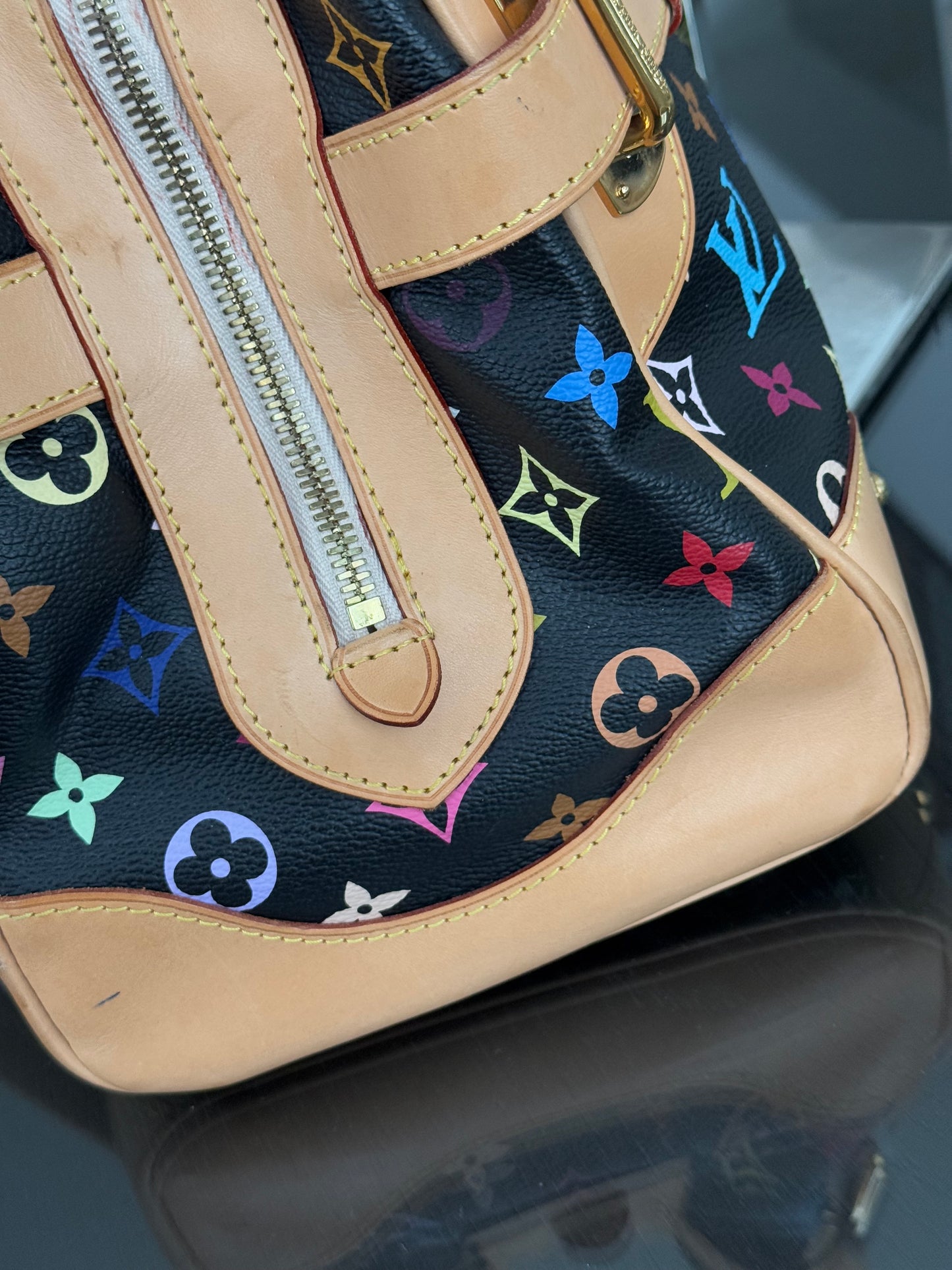 Murakami / Multicolor Claudia with Dustbag π
Year: 2009