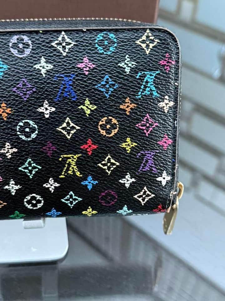 Multicolor Zippy Long Wallet in Black with Box , Dustbag and Paper bag Year: 2010