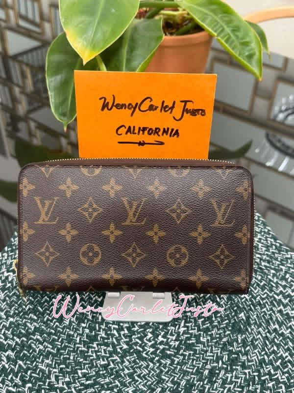 Monogram Zippy Wallet Organizer 🗓️ Year: 2009