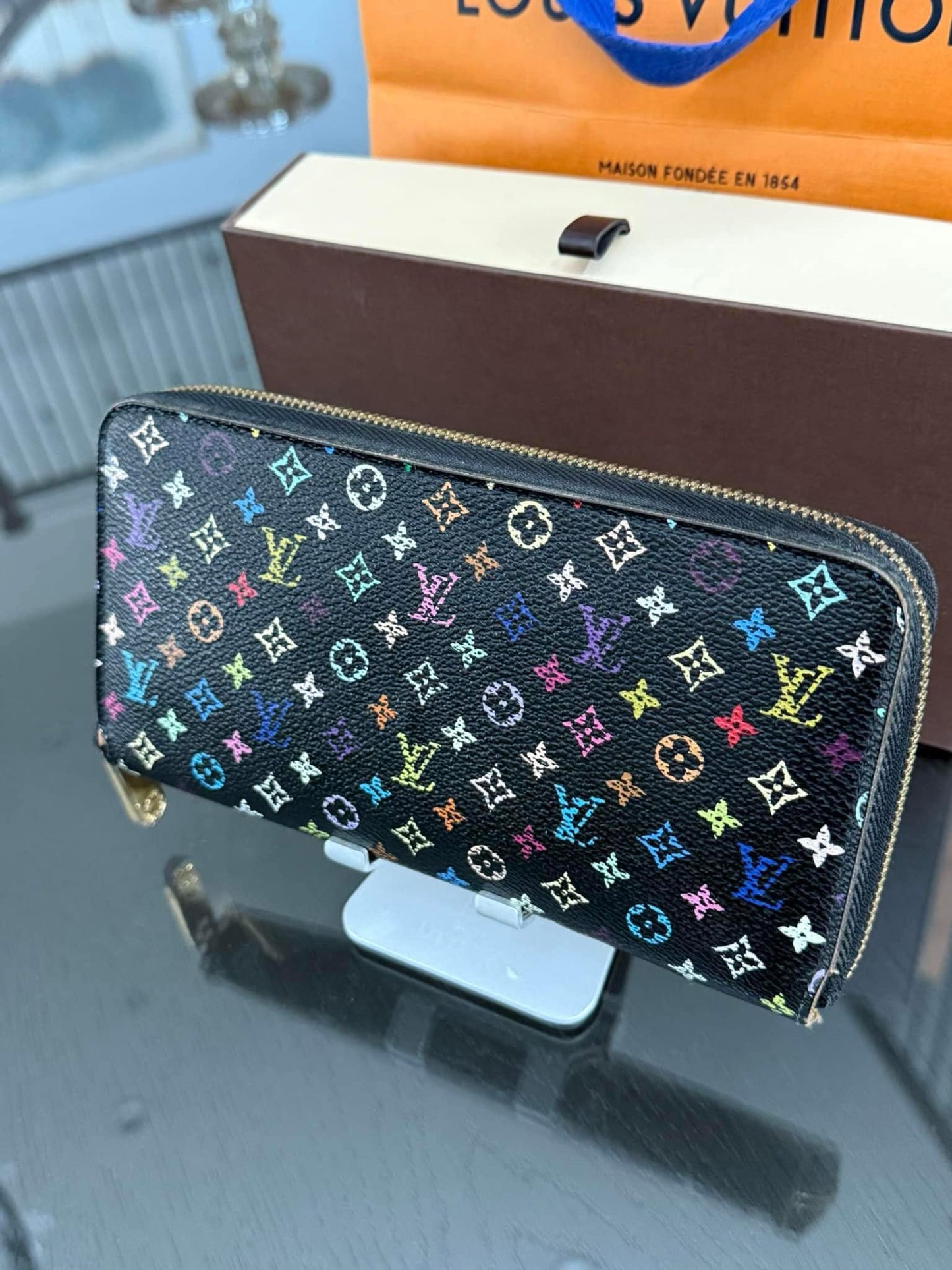 Multicolor Zippy Long Wallet in Black with Box , Dustbag and Paper bag Year: 2010