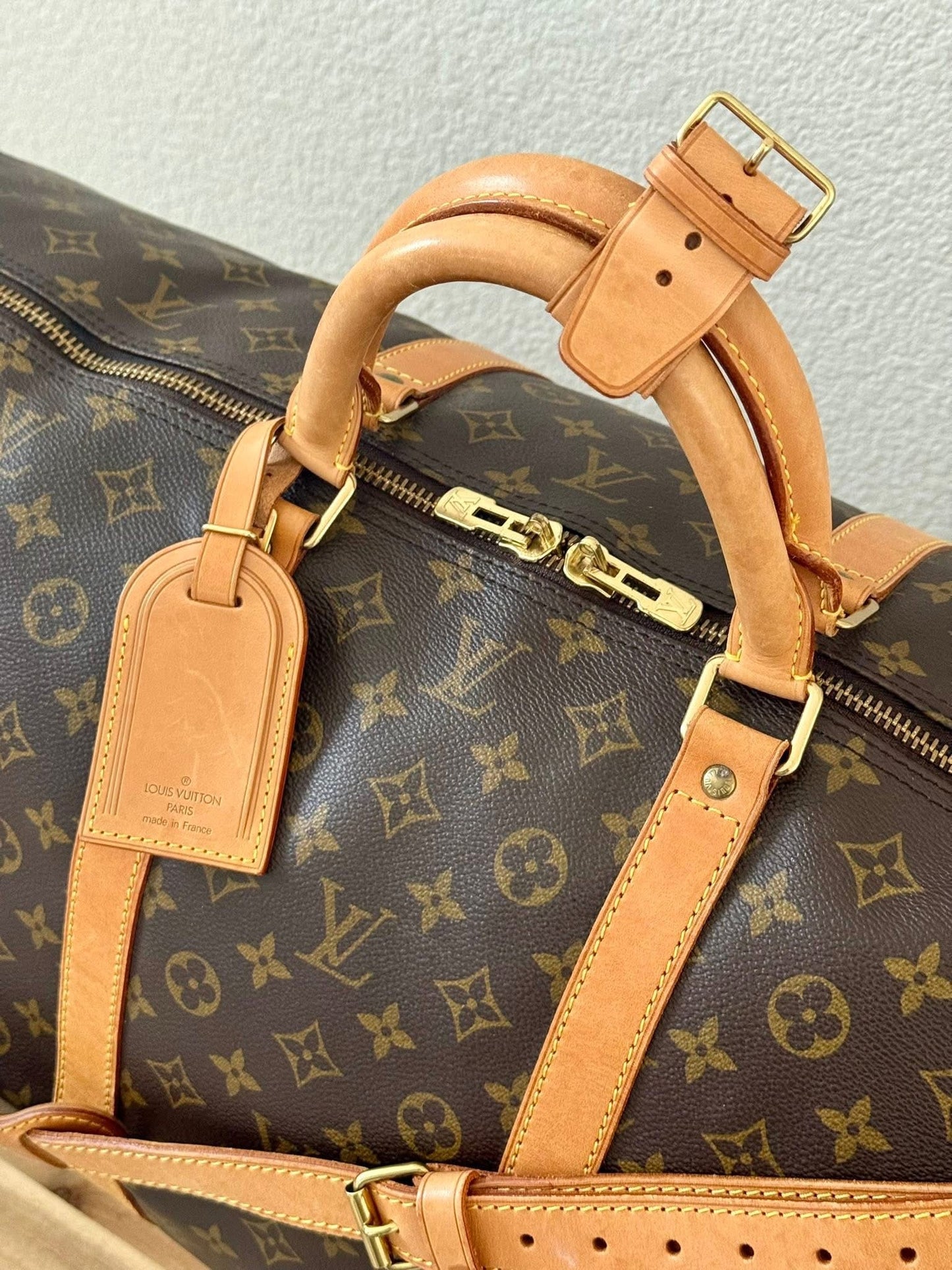Keepall 60 Bandoulier with Original Strap, Luggage Tag and Poignet 📅 Year: 1994