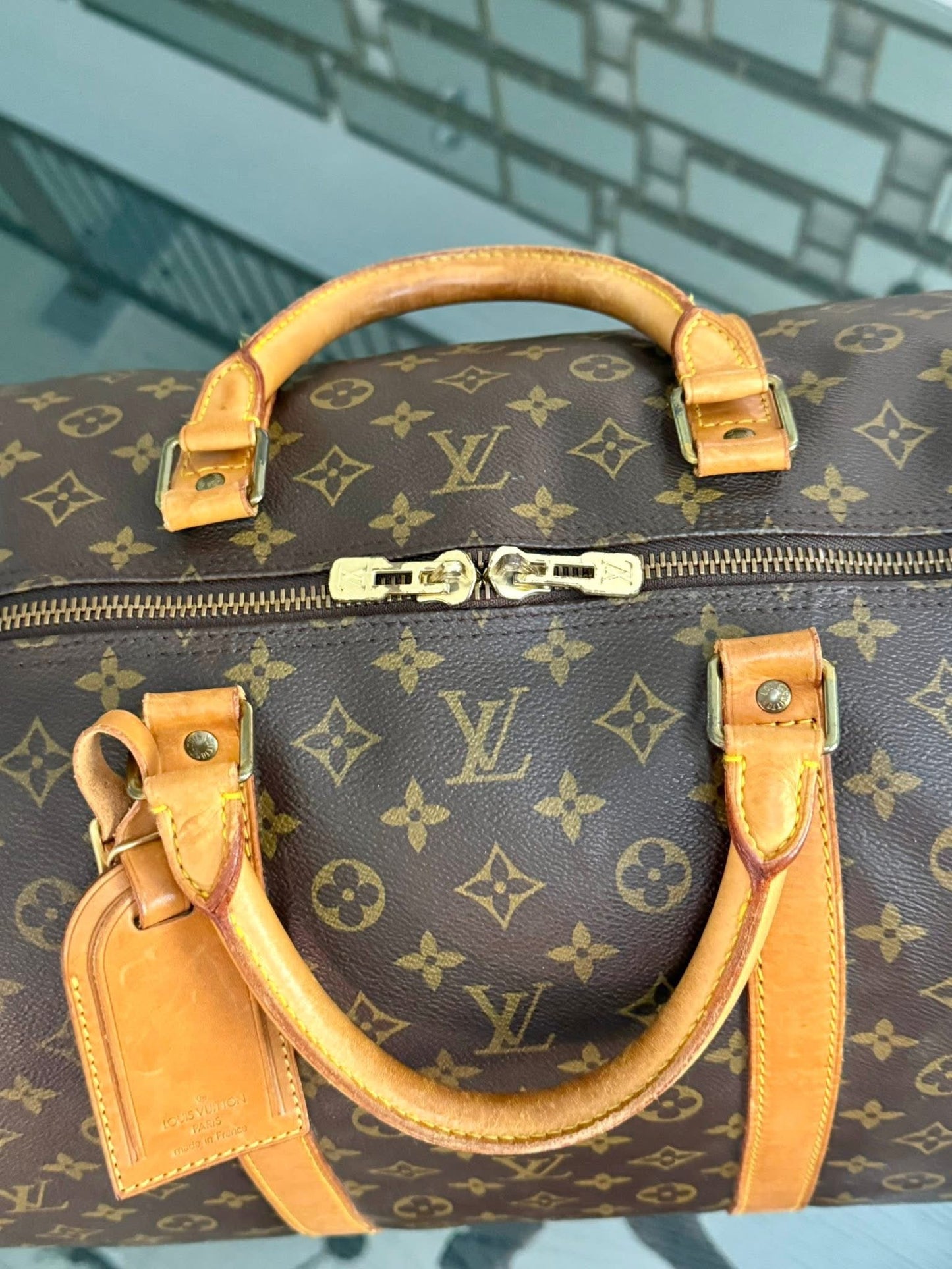 Keepall 60 Bandoulier with Original Strap, Luggage Tag and Poignet 📅 Year: 1991