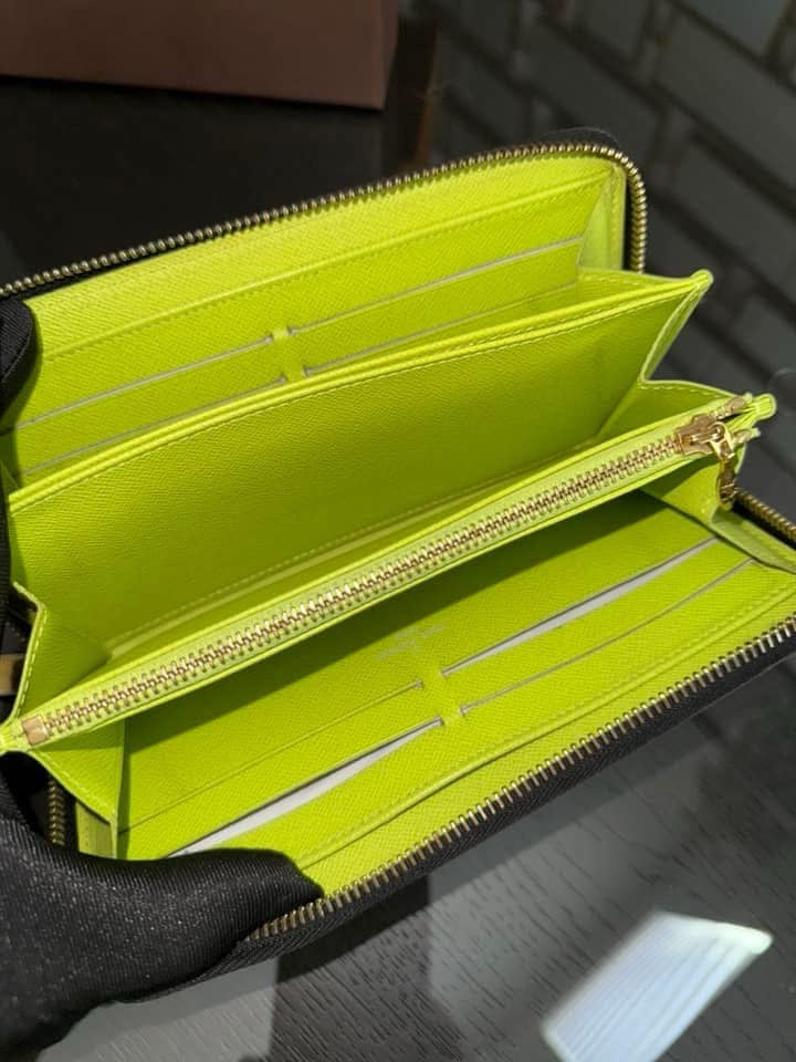 Multicolor Zippy Long Wallet in Black with Box , Dustbag and Paper bag Year: 2010