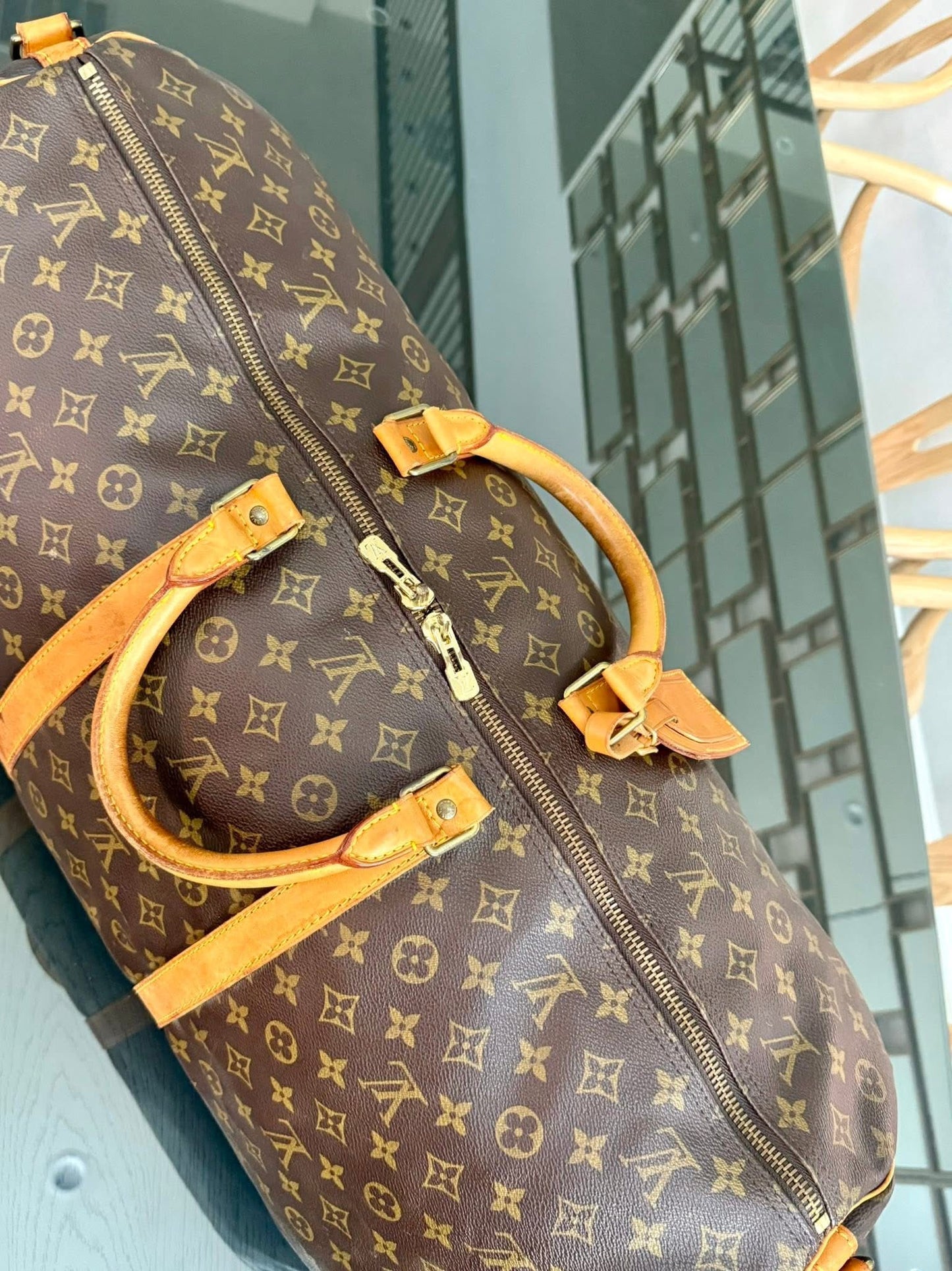 Keepall 60 Bandoulier with Original Strap, Luggage Tag and Poignet 📅 Year: 1991