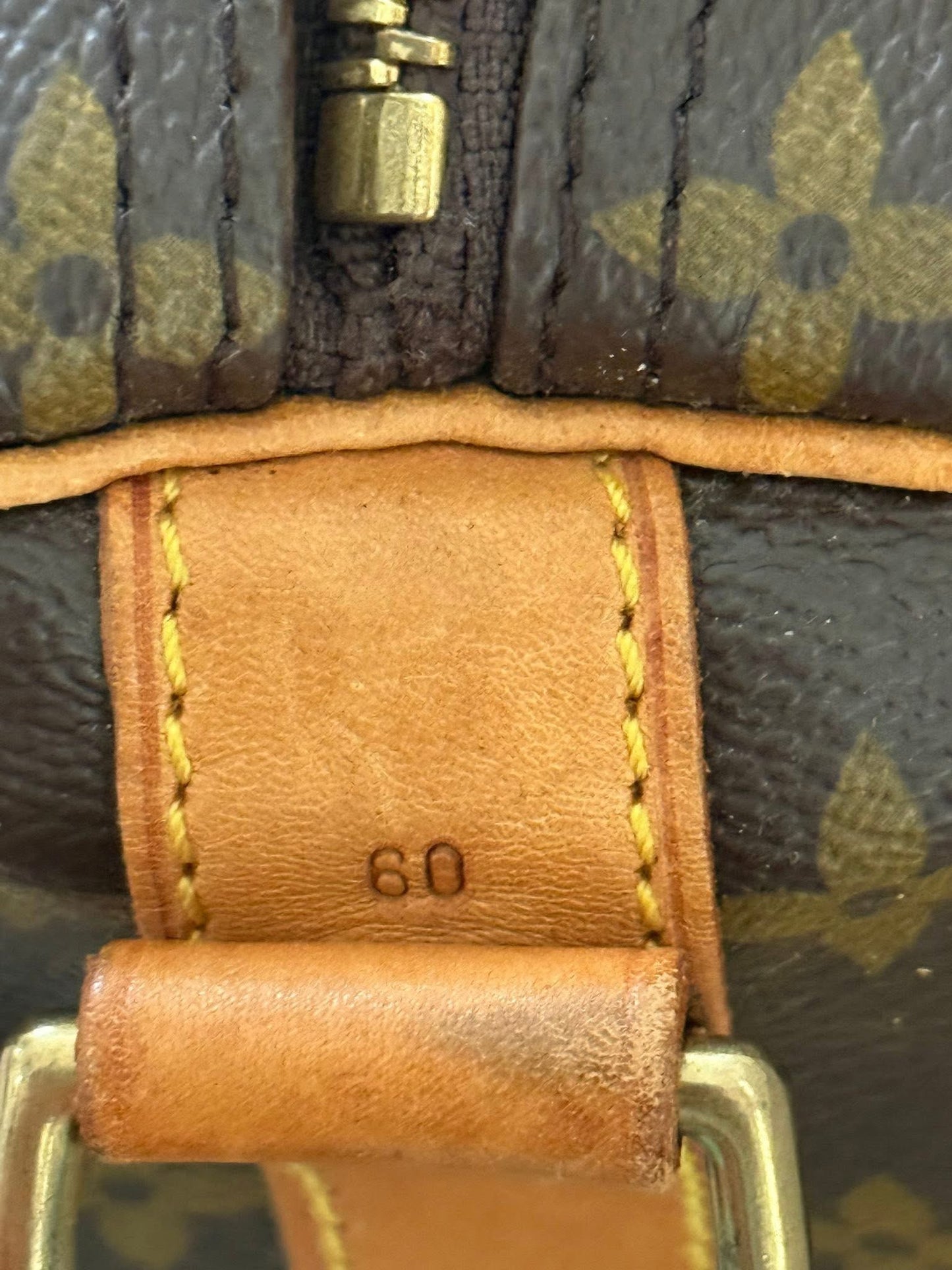 Keepall 60 Bandoulier with Original Strap, Luggage Tag and Poignet 📅 Year: 1994