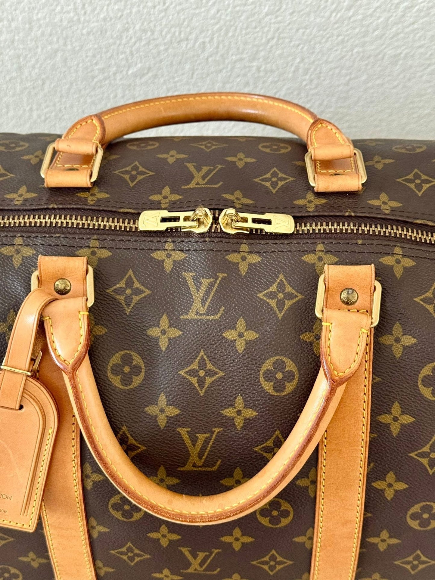 Keepall 60 Bandoulier with Original Strap, Luggage Tag and Poignet 📅 Year: 1994
