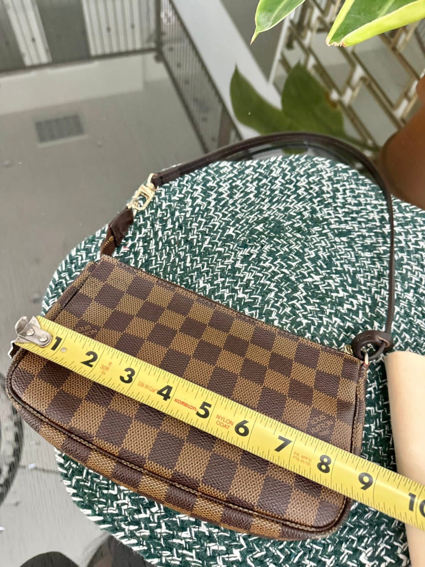 Pochette Accessories in DE with Non branded Strap 📅 Year: 2007