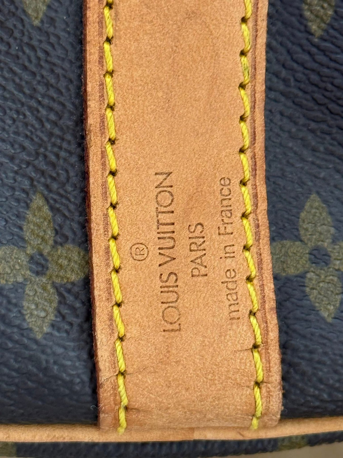 Keepall 60 Bandoulier with Original Strap, Luggage Tag and Poignet 📅 Year: 1991