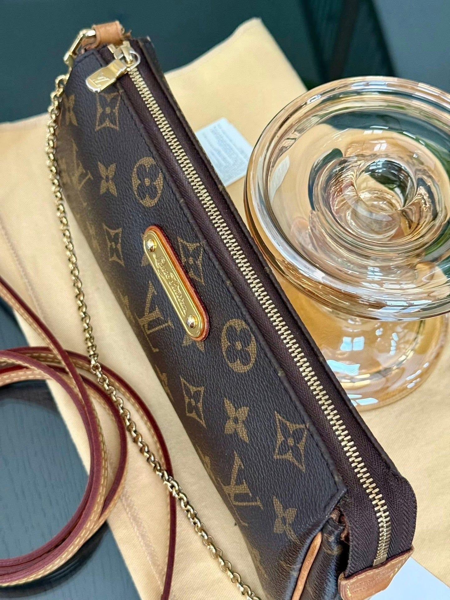 Eva Clutch in Monogram with Dustbag, Box and Paper bag 🗓️ Year: 2014