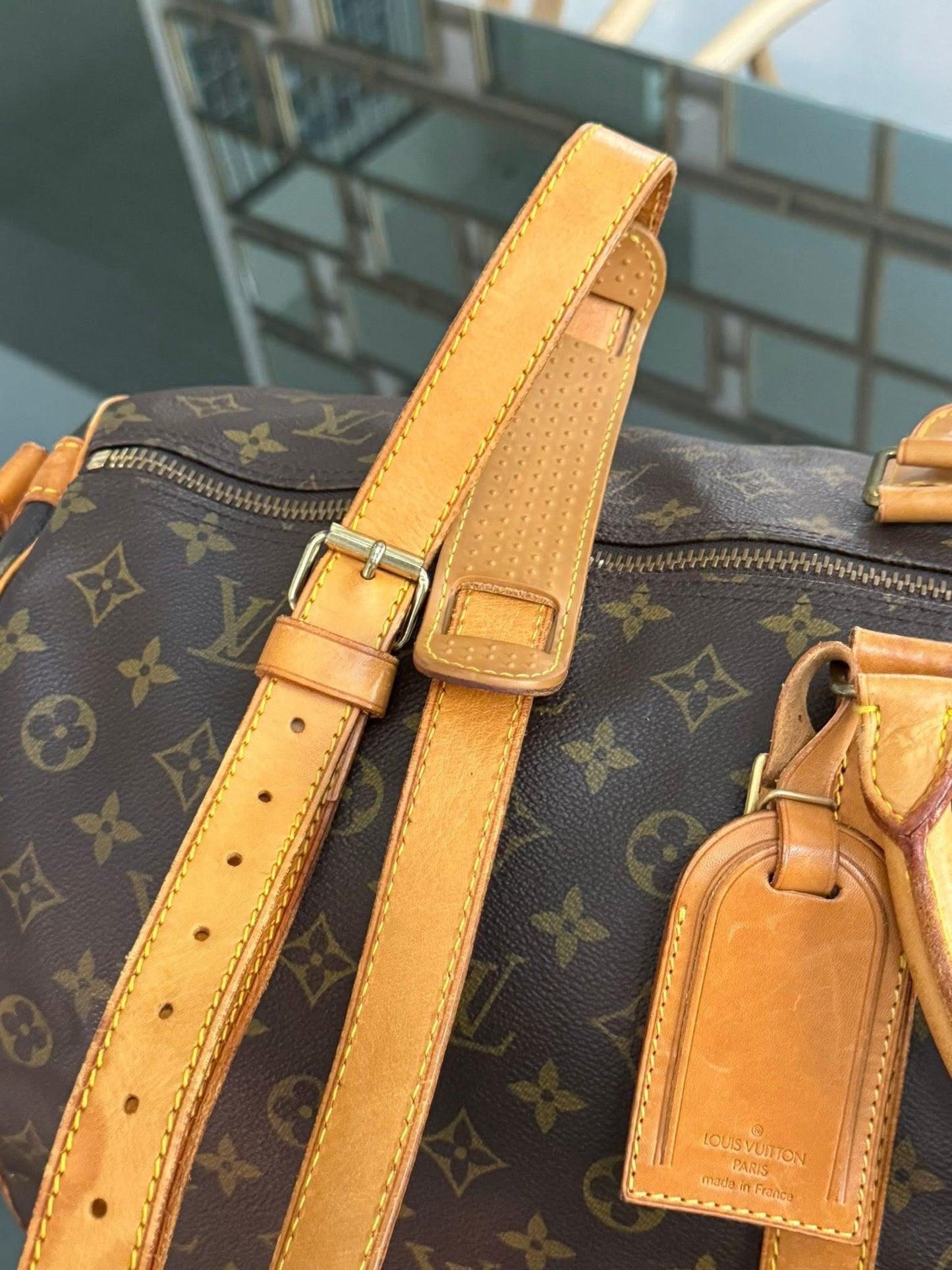 Keepall 60 Bandoulier with Original Strap, Luggage Tag and Poignet 📅 Year: 1991