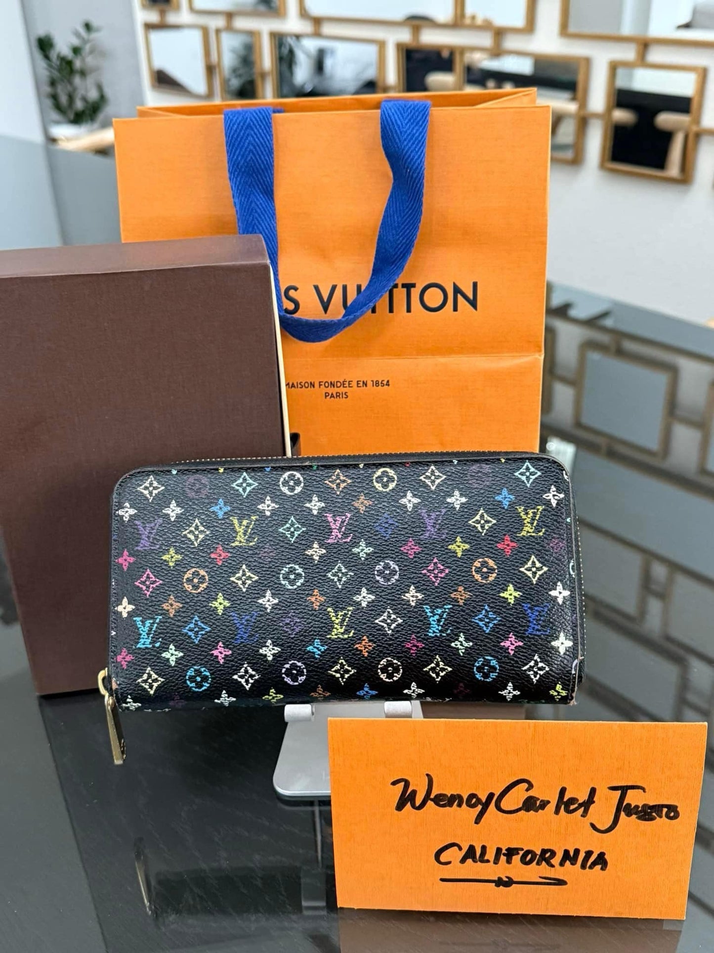 Multicolor Zippy Long Wallet in Black with Box , Dustbag and Paper bag Year: 2010