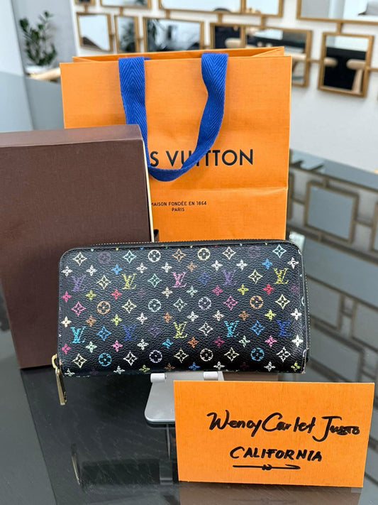Multicolor Zippy Long Wallet in Black with Box , Dustbag and Paper bag Year: 2010