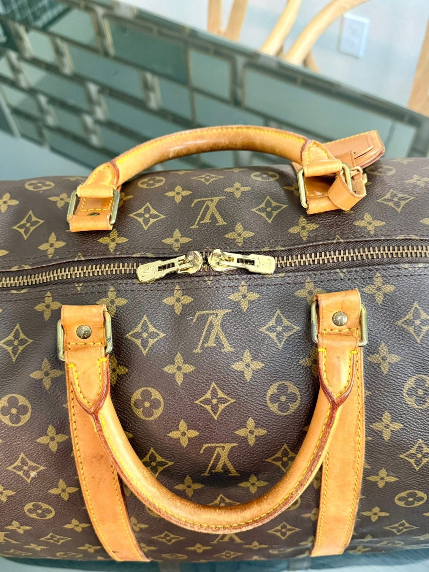 Keepall 60 Bandoulier with Original Strap, Luggage Tag and Poignet 📅 Year: 1991