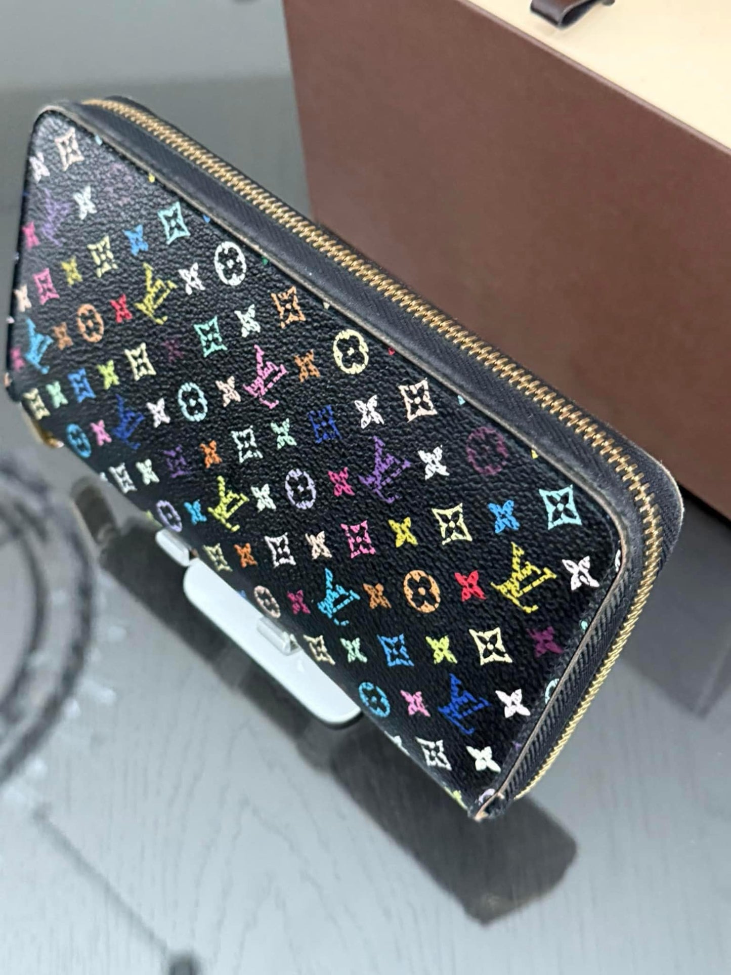 Multicolor Zippy Long Wallet in Black with Box , Dustbag and Paper bag Year: 2010