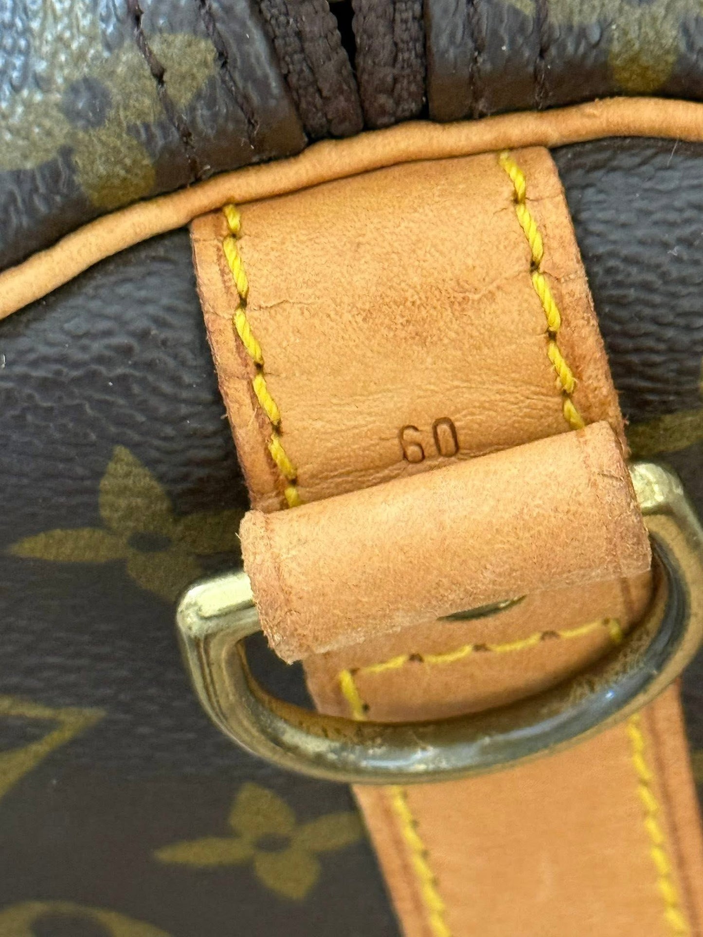 Keepall 60 Bandoulier with Original Strap, Luggage Tag and Poignet 📅 Year: 1991