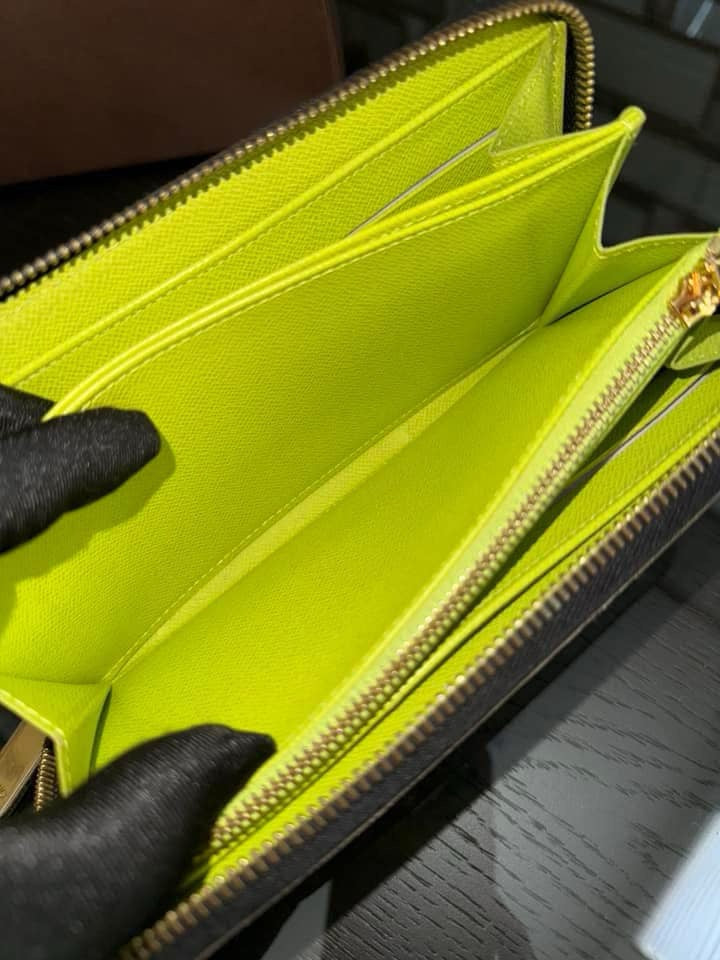 Multicolor Zippy Long Wallet in Black with Box , Dustbag and Paper bag Year: 2010