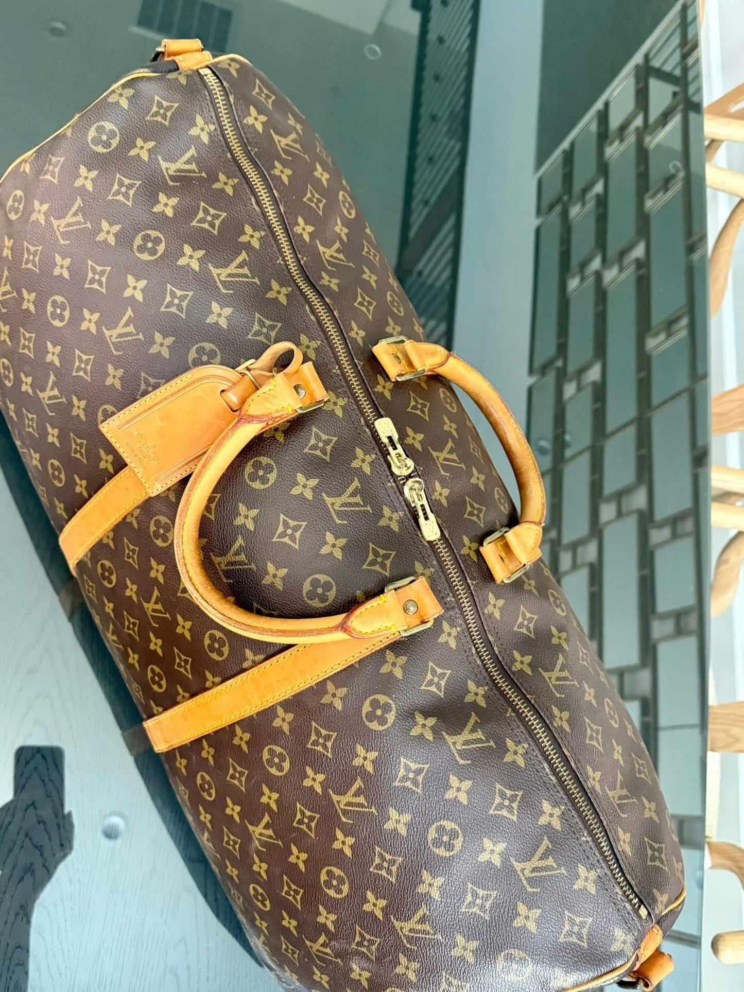Keepall 60 Bandoulier with Original Strap, Luggage Tag and Poignet 📅 Year: 1991
