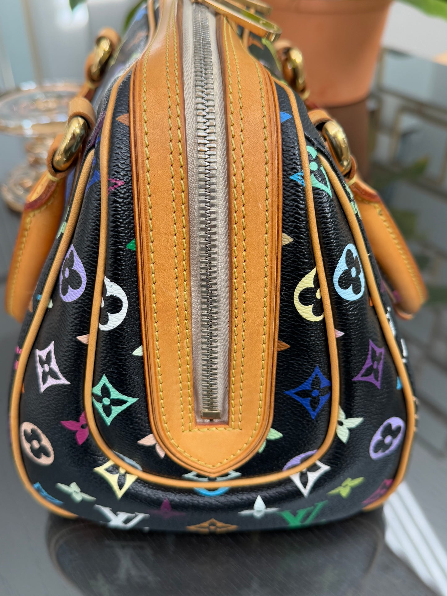 Multicolor Priscilla with Dustbag 📅 Year: 2008