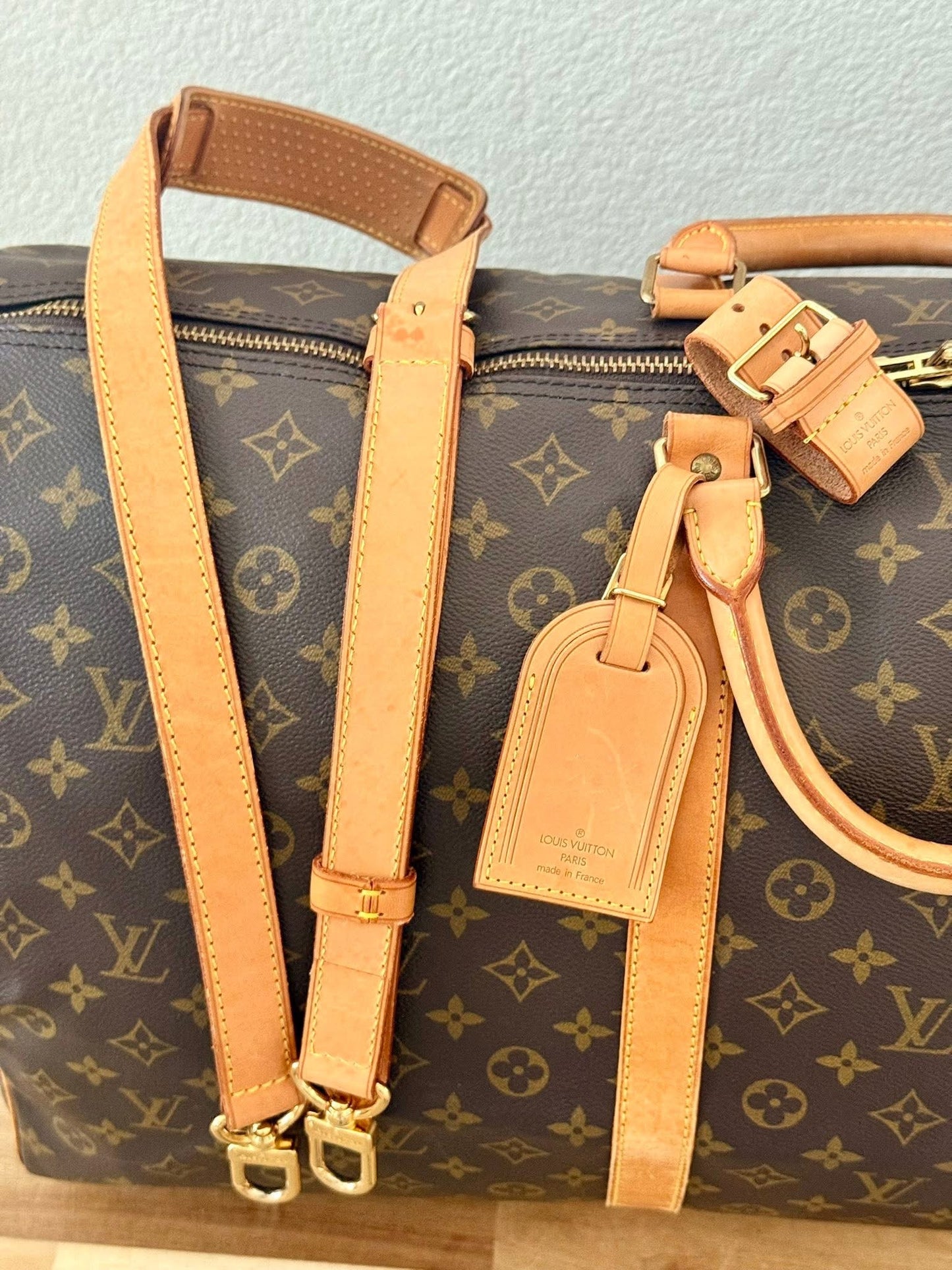 Keepall 60 Bandoulier with Original Strap, Luggage Tag and Poignet 📅 Year: 1994