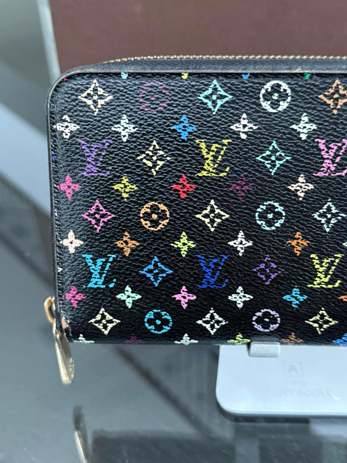 Multicolor Zippy Long Wallet in Black with Box , Dustbag and Paper bag Year: 2010