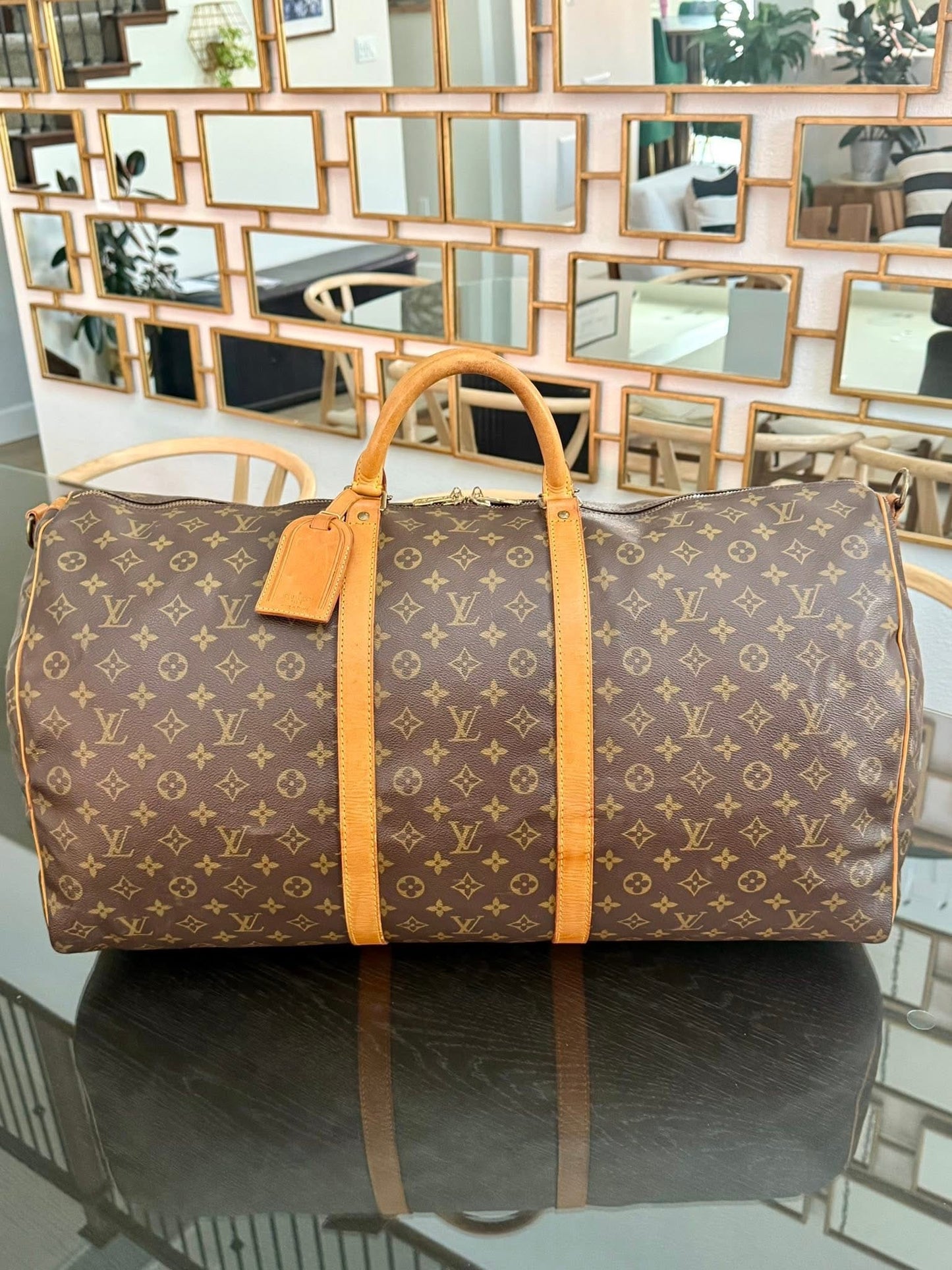 Keepall 60 Bandoulier with Original Strap, Luggage Tag and Poignet 📅 Year: 1991