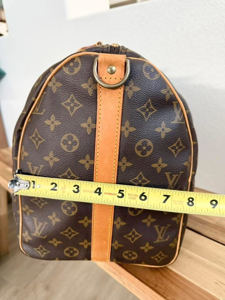 Keepall 50 Bandoulier with Original Strap, Luggage tag and Poignet  📅 Year: 1990
