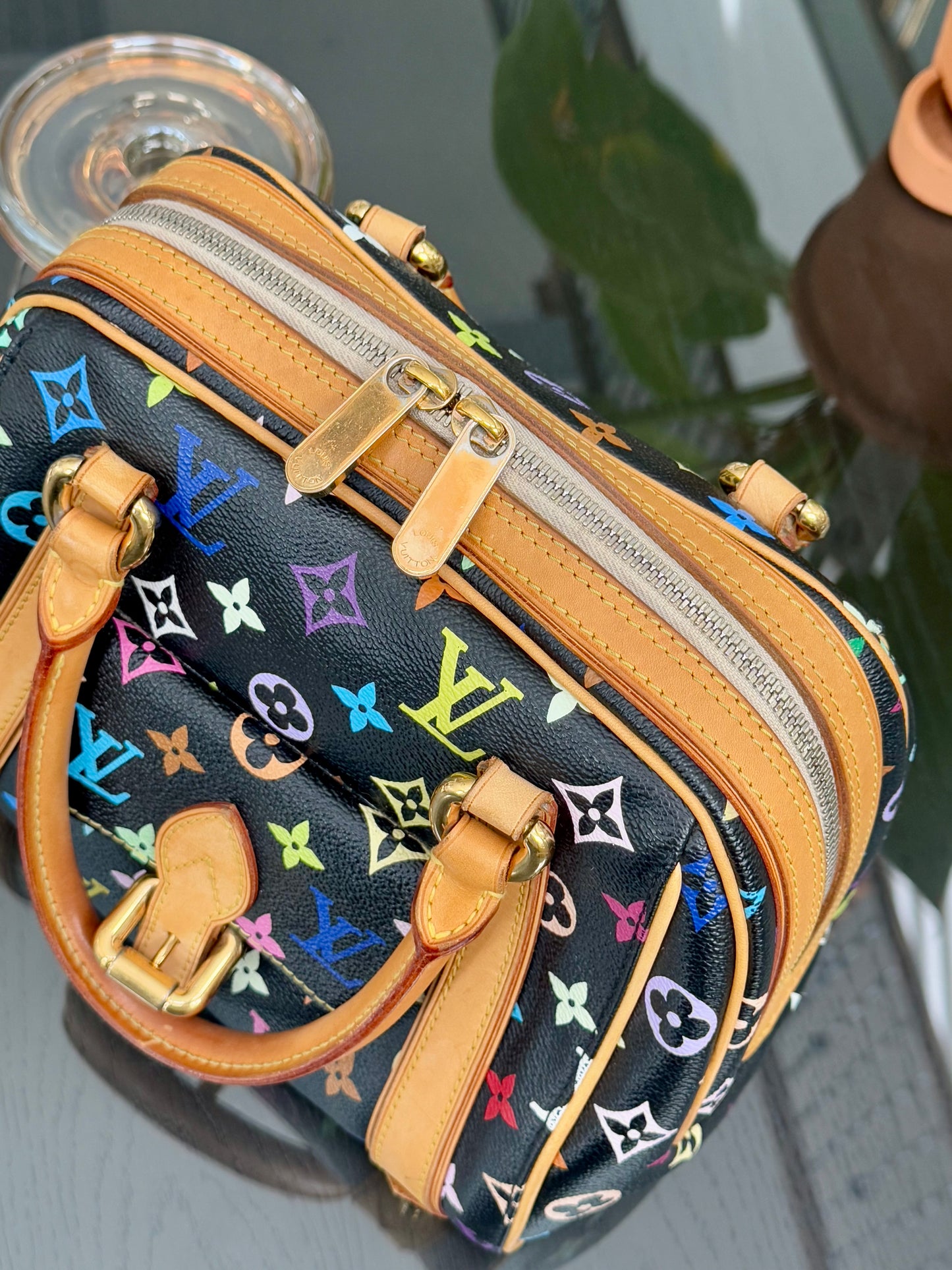 Multicolor Priscilla with Dustbag 📅 Year: 2008