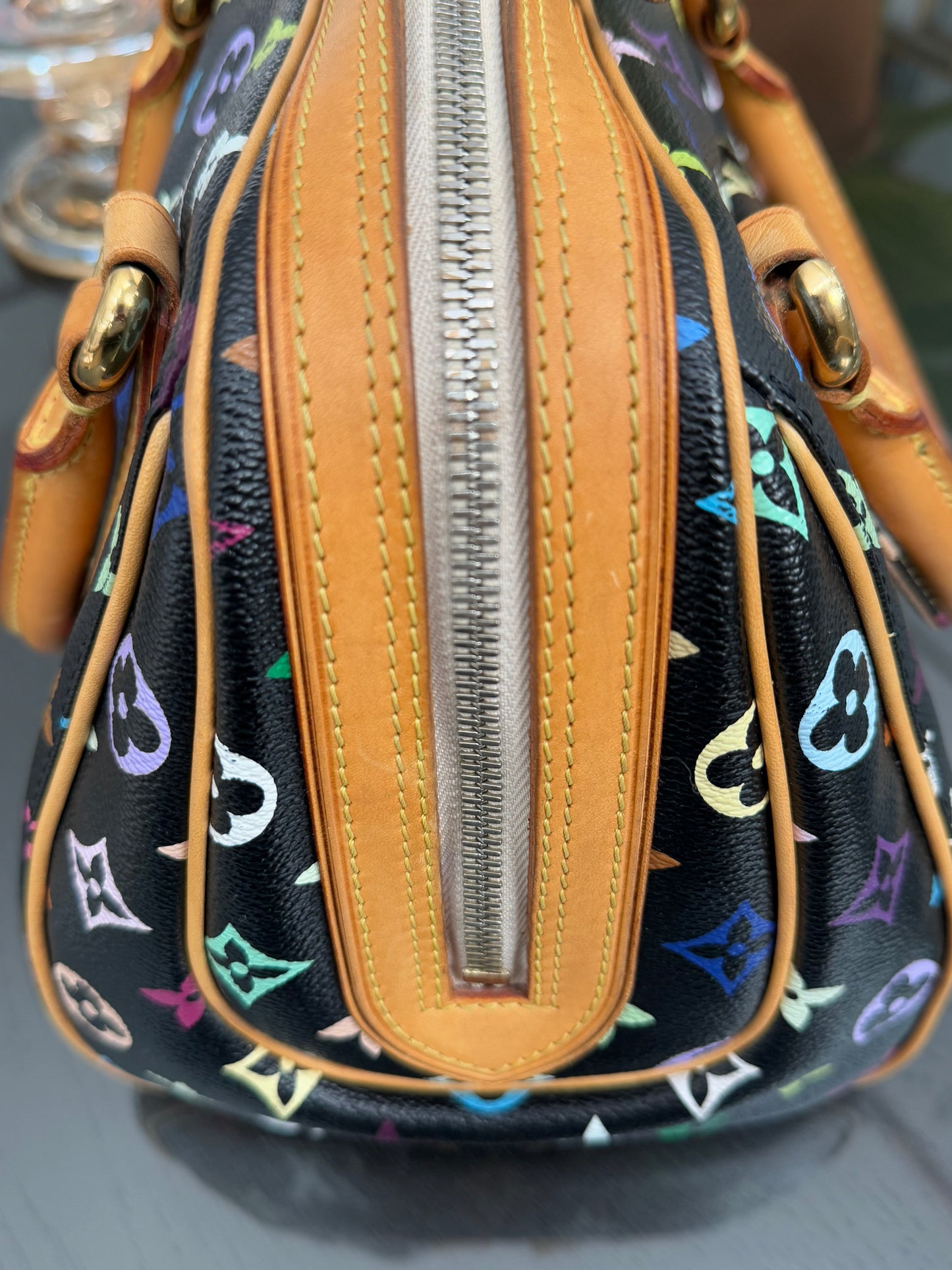 Multicolor Priscilla with Dustbag 📅 Year: 2008