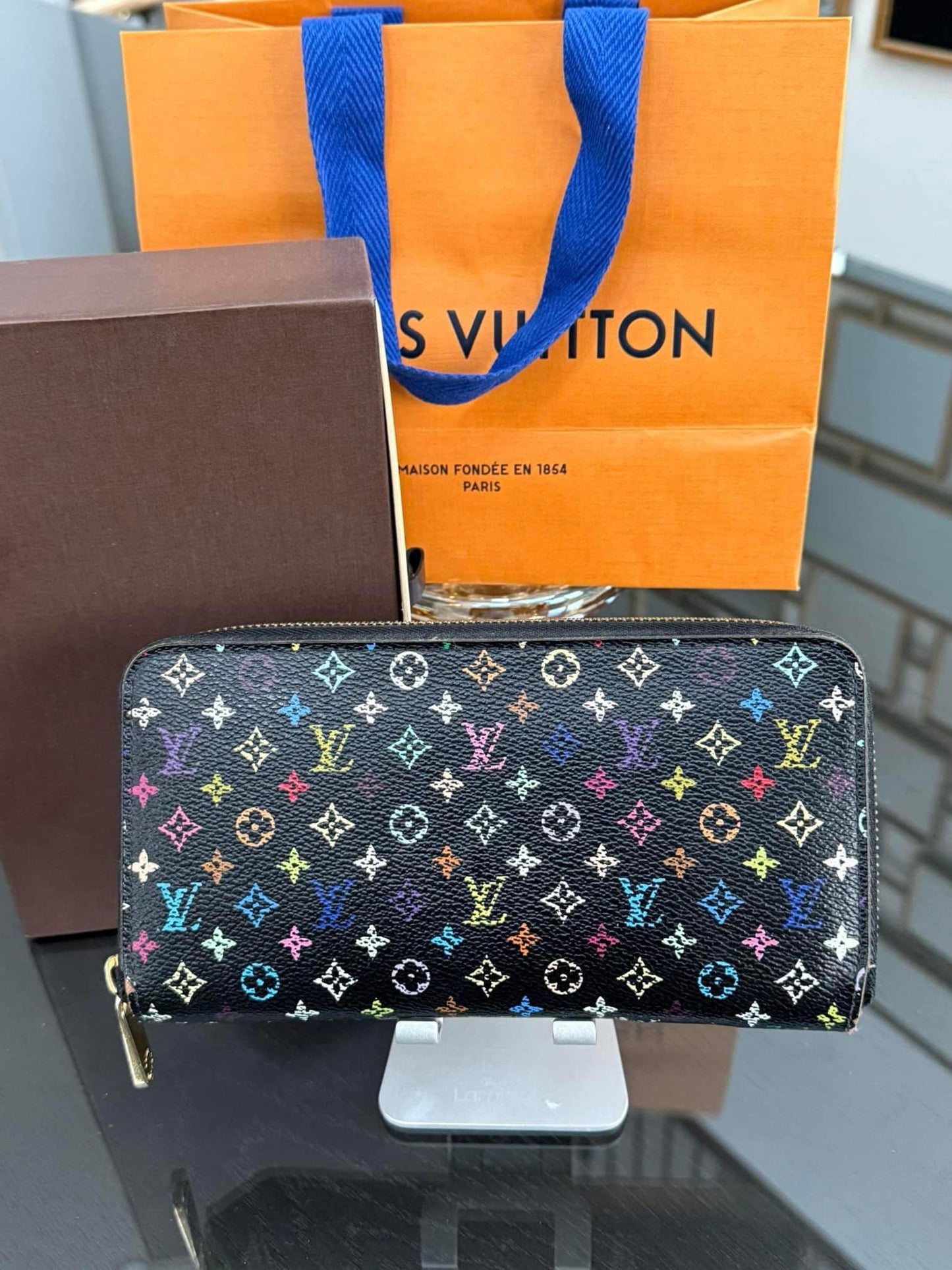 Multicolor Zippy Long Wallet in Black with Box , Dustbag and Paper bag Year: 2010