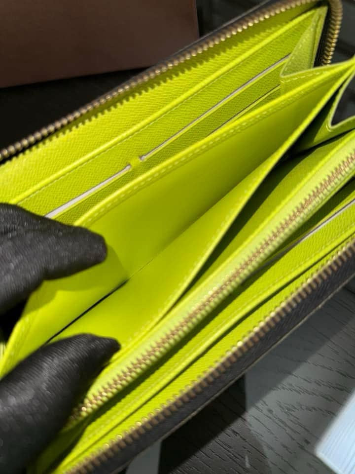 Multicolor Zippy Long Wallet in Black with Box , Dustbag and Paper bag Year: 2010