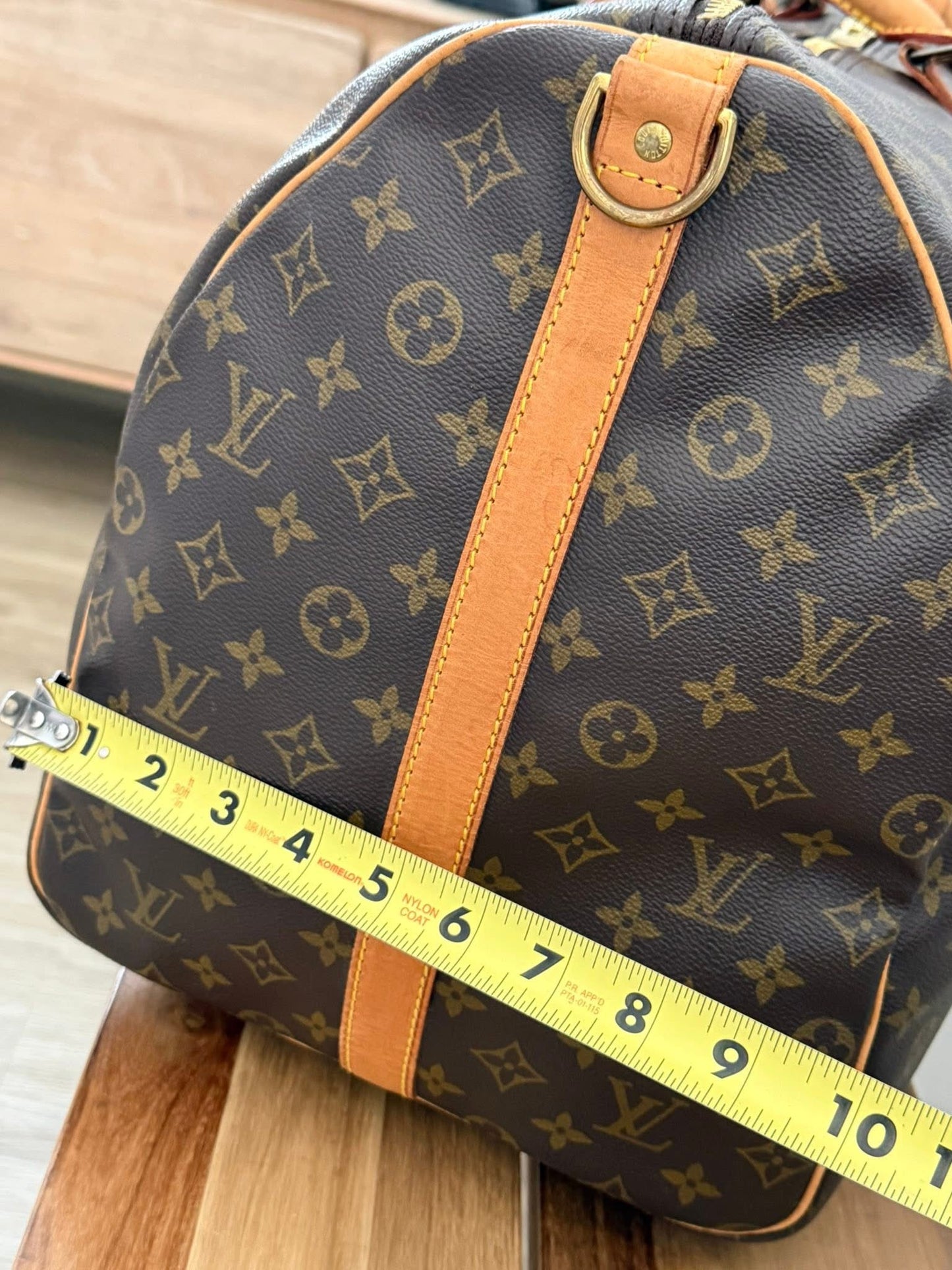 Keepall 60 Bandoulier with Original Strap, Luggage Tag and Poignet 📅 Year: 1991