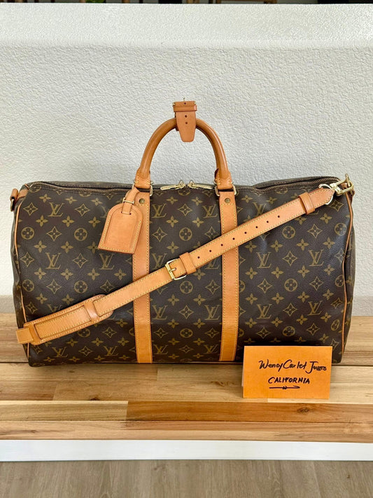 Keepall 50 Bandoulier with Luggage Tag and Poignet 📅 Year: 1995