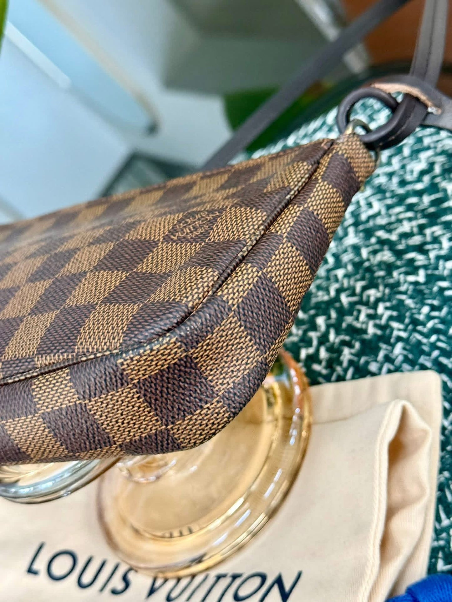 Pochette Accessories in DE with Non branded Strap 📅 Year: 2007