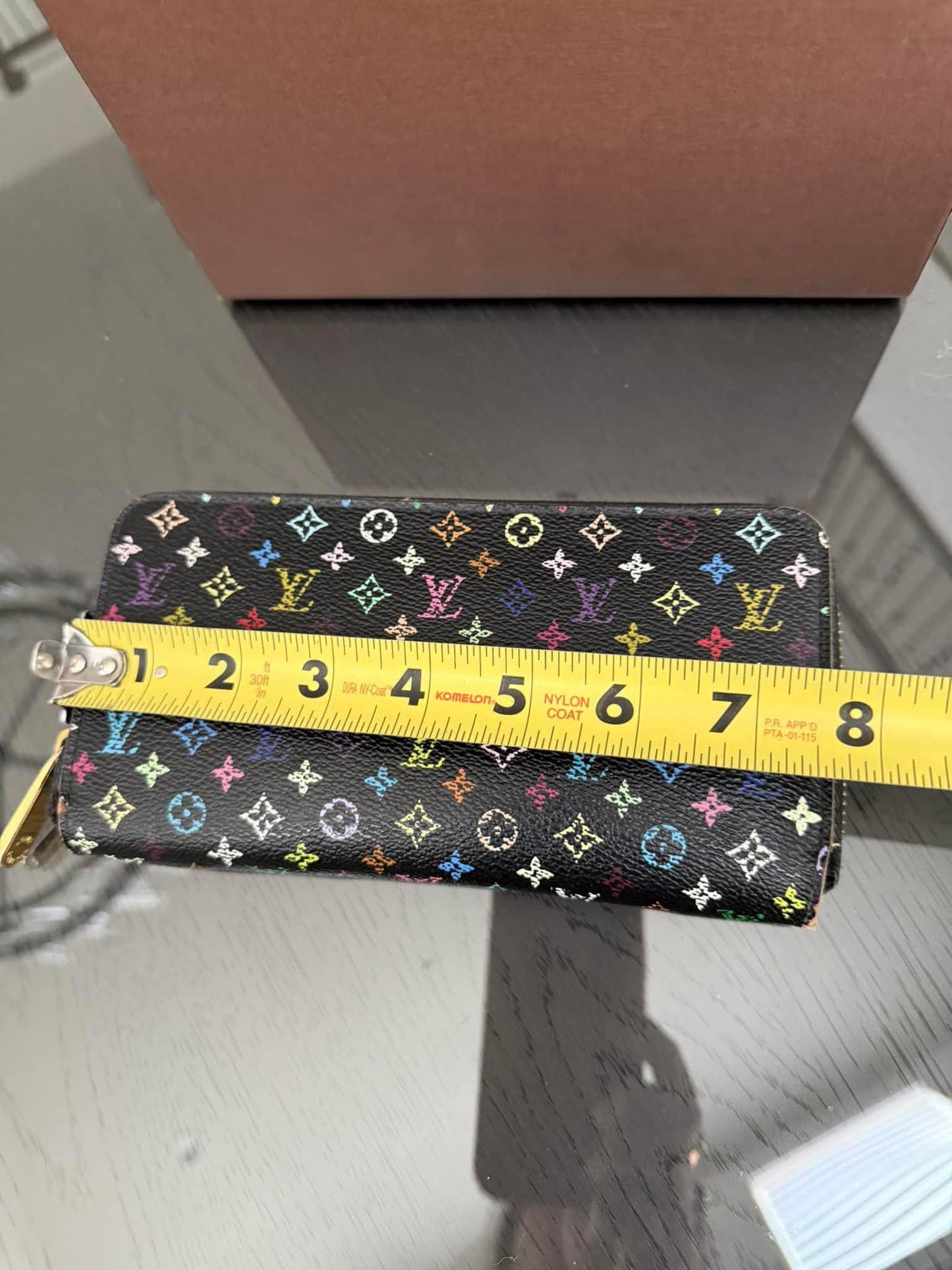 Multicolor Zippy Long Wallet in Black with Box , Dustbag and Paper bag Year: 2010