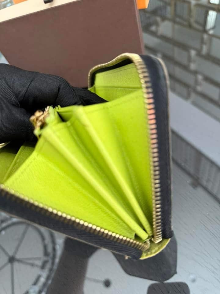 Multicolor Zippy Long Wallet in Black with Box , Dustbag and Paper bag Year: 2010