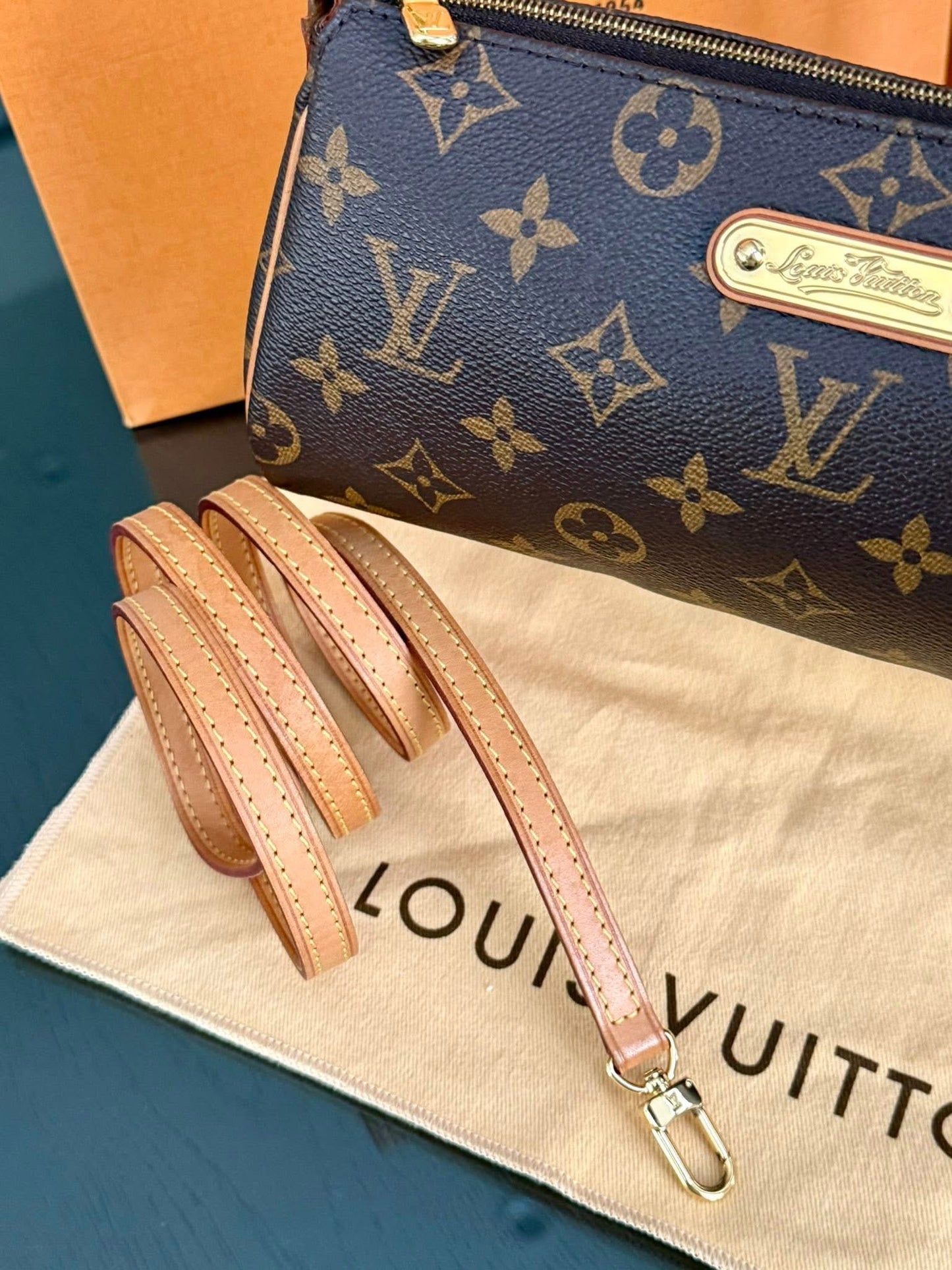 Eva Clutch in Monogram with Original Strap, Insert Organizer, Box, Dustbag and Paper bag 🗓️ Year: 2011