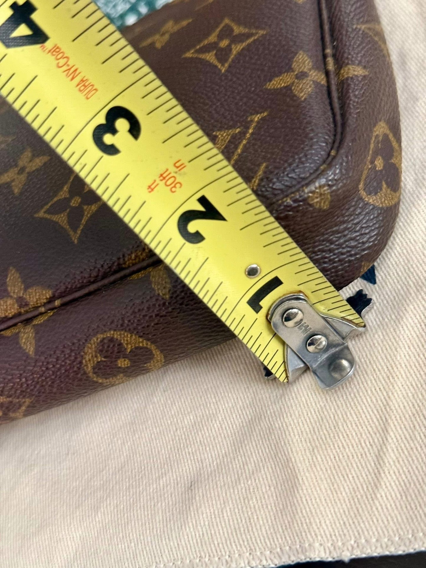 Pochette Accessories with Dustbag 📅 Year: 1999