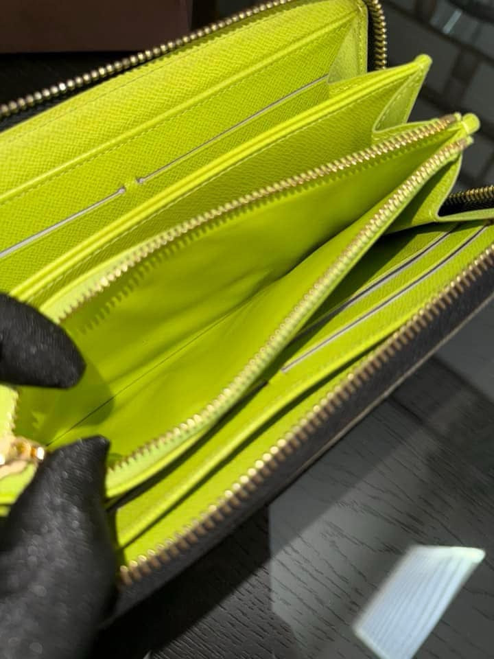 Multicolor Zippy Long Wallet in Black with Box , Dustbag and Paper bag Year: 2010
