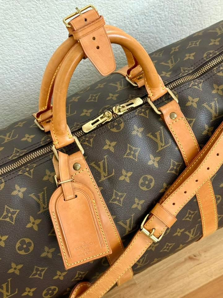 Keepall 50 Bandoulier with Luggage Tag and Poignet 📅 Year: 1995