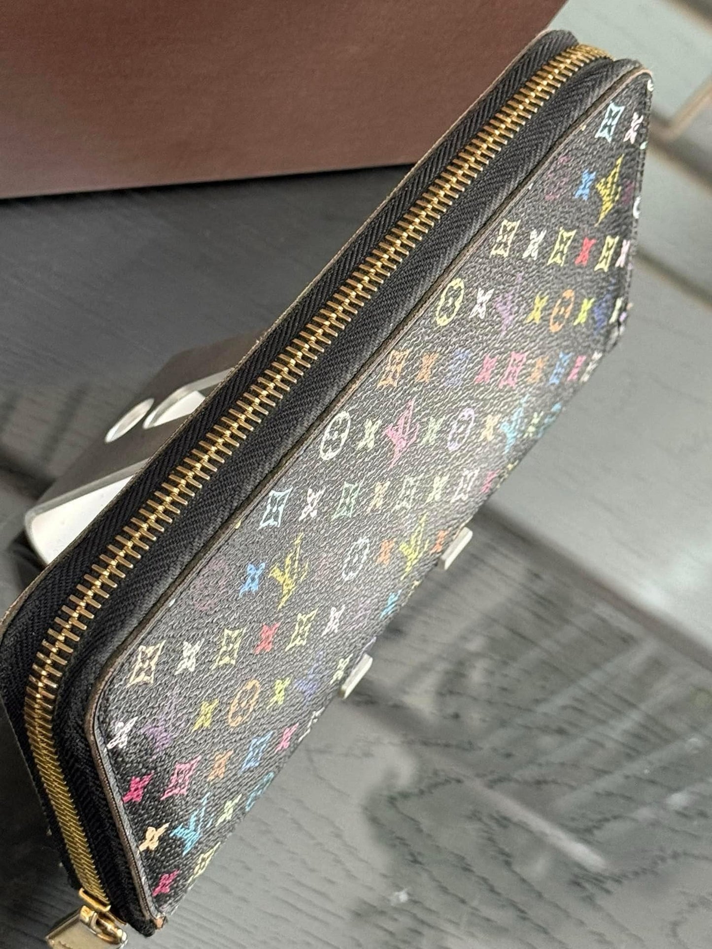 Multicolor Zippy Long Wallet in Black with Box , Dustbag and Paper bag Year: 2010