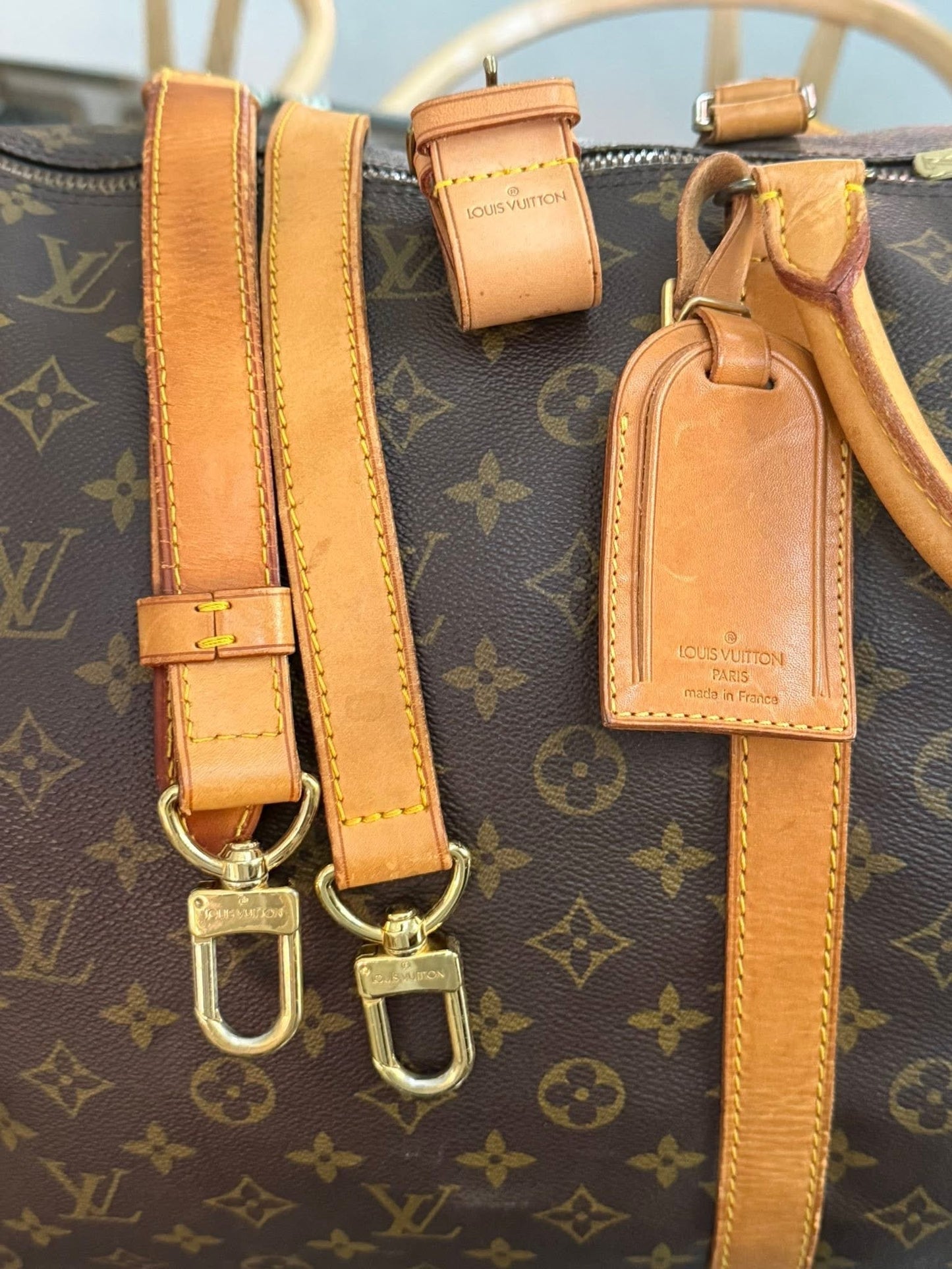 Keepall 60 Bandoulier with Original Strap, Luggage Tag and Poignet 📅 Year: 1991