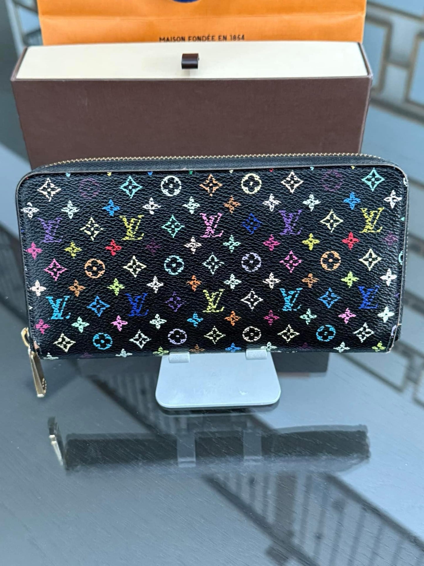 Multicolor Zippy Long Wallet in Black with Box , Dustbag and Paper bag Year: 2010