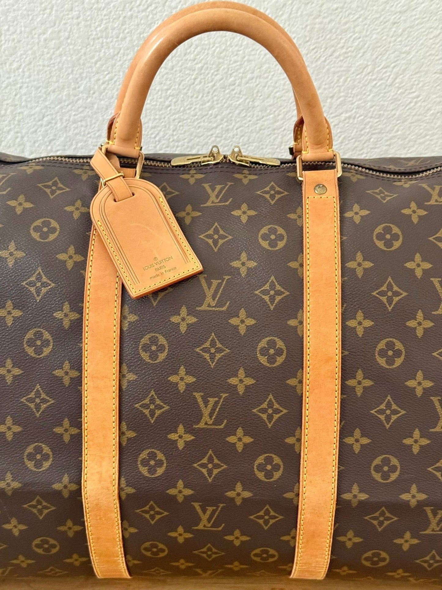 Keepall 60 Bandoulier with Original Strap, Luggage Tag and Poignet 📅 Year: 1994